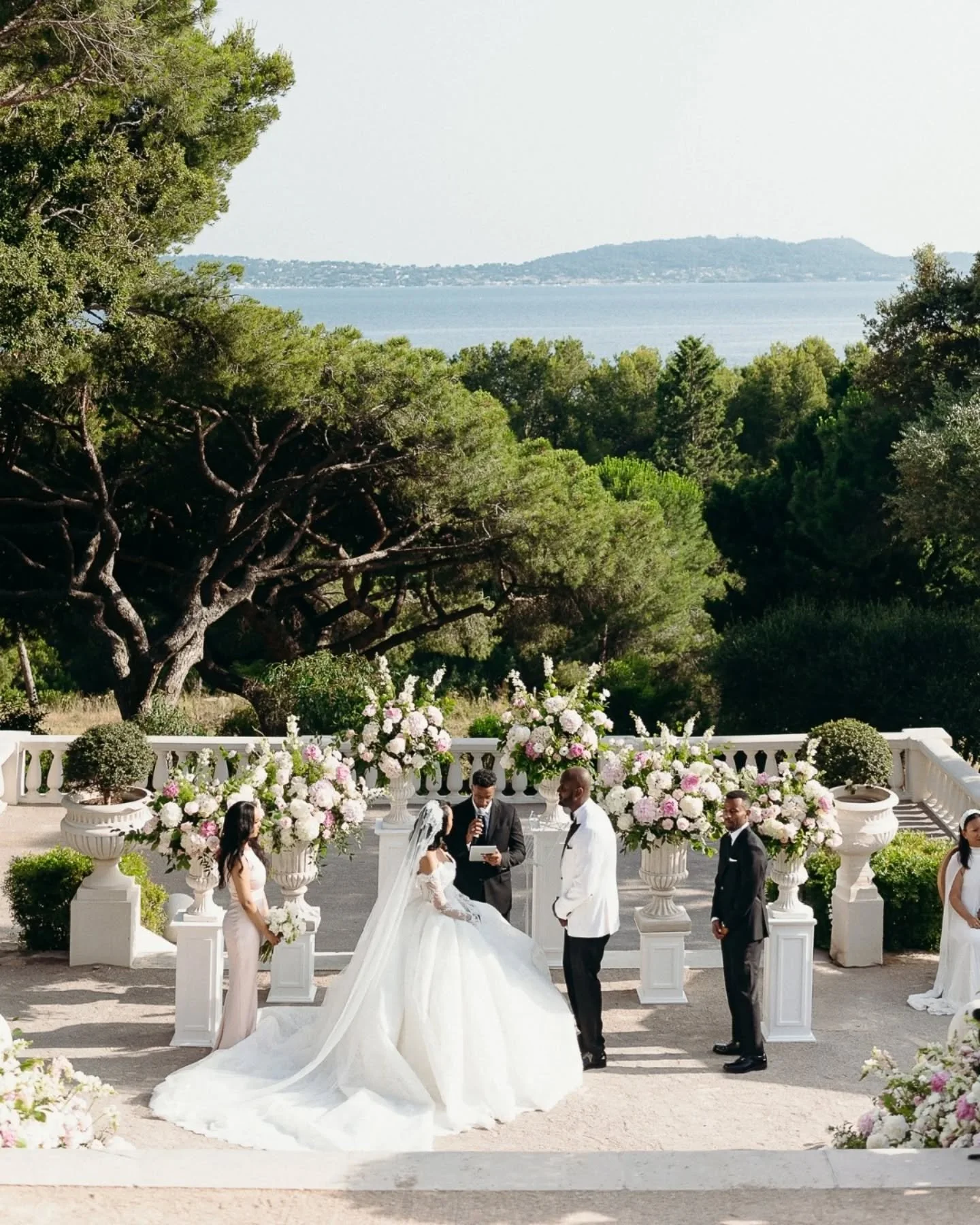 String quartet ceremony, sunset over the Mediterranean sea, a beige &amp; green natural reception decor &amp; outdoor tables, everything gathered to create the perfect provencal &amp; elegant backdrop you have ever dreamt of for your destination wedd