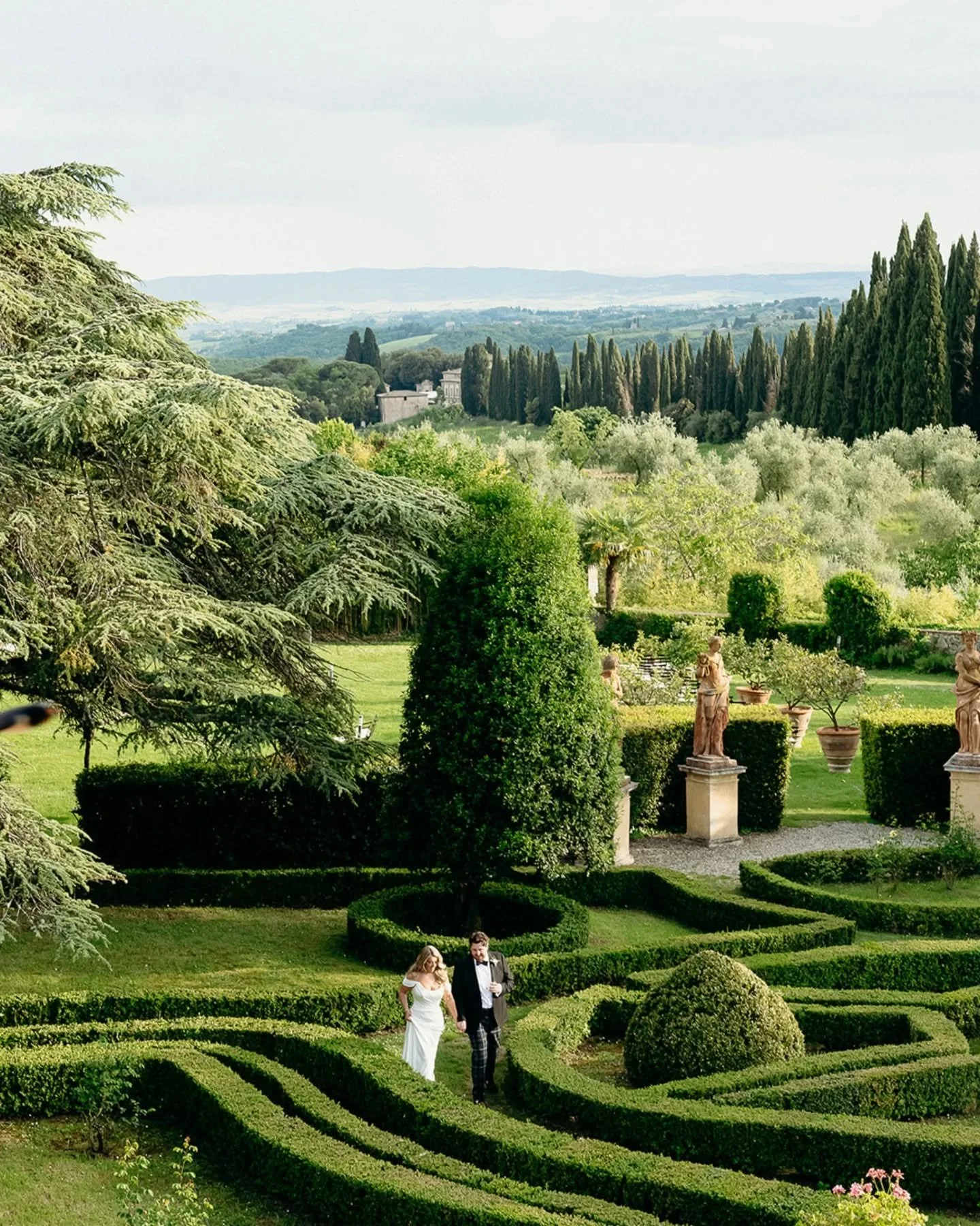 When photographing in the gorgeous Villa Catignano gardens, in Tuscany, Italy, it feels like like an endless summer dream. This is a mix of digital and films, shot in the early spring, where all the greens were popping and the white could splash out 