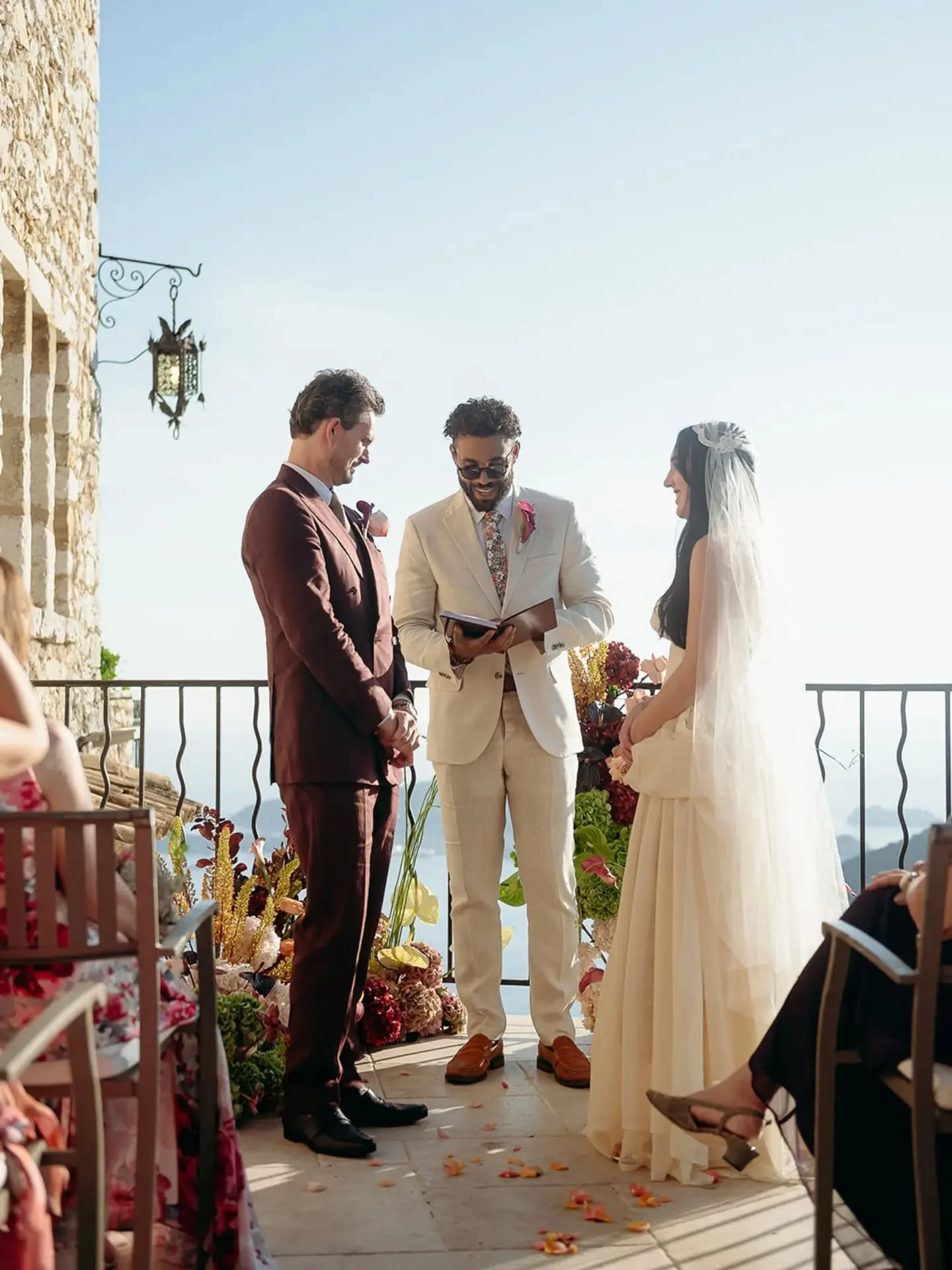 Here's what I don't get to see often, &amp; I mean rarely: the colour of the whole day carried by the groom. Bret went for an oxblood linen suit, double-breasted, &amp; he wore it straight through, from the first walk along the terrace to the last gl