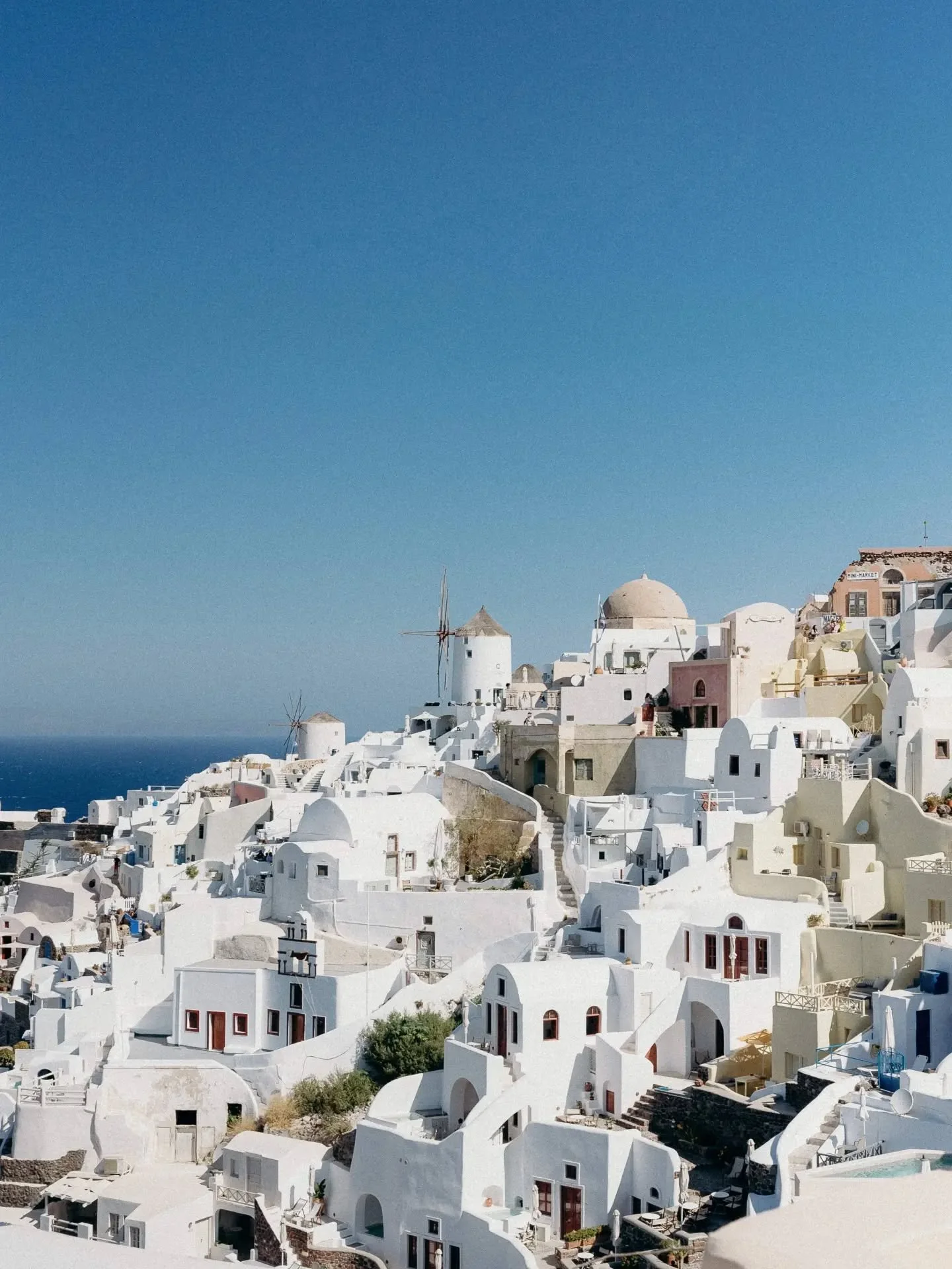 Santorini did something to me, I couldn't stop looking at the blue. Not one blue though, that's the whole thing, the dome is a blue, the sea is another, the little gate is a third, the sky above them all is something else entirely, &amp; none of them
