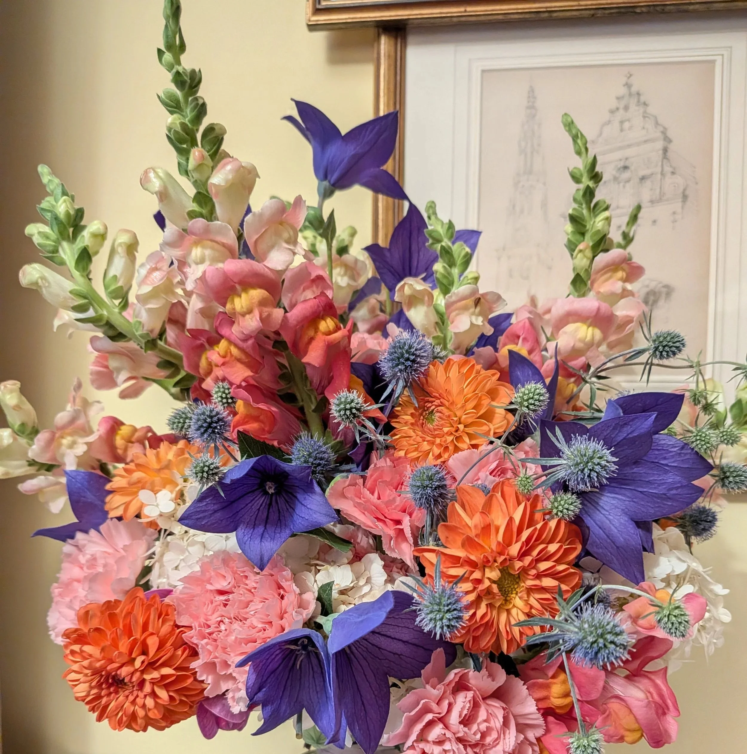 Colourful bridal bouquet for a summer wedding at the Palm House, Sefton Park