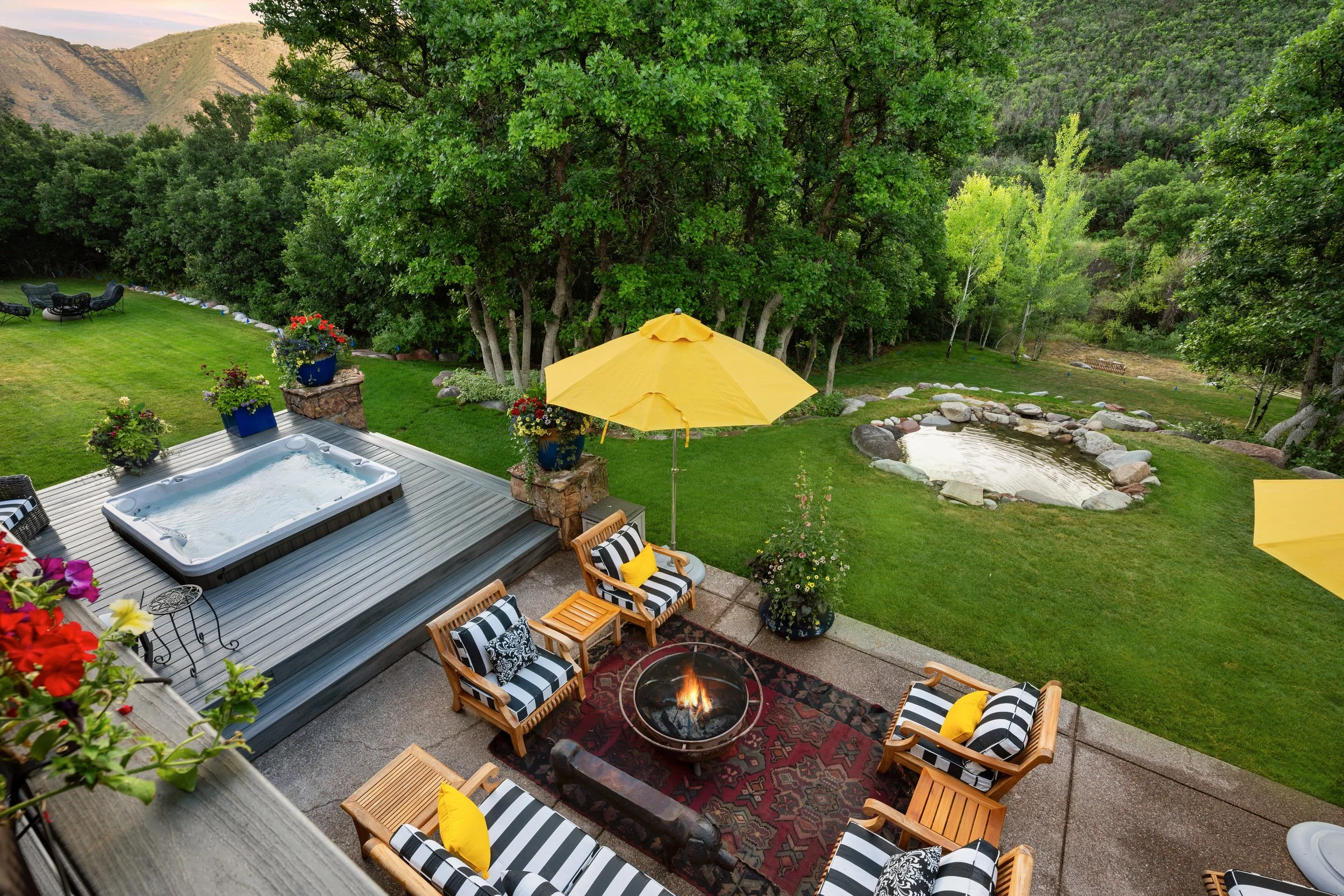 12-Backyard from upper deck. 12 hot tub, fire, pond.jpg