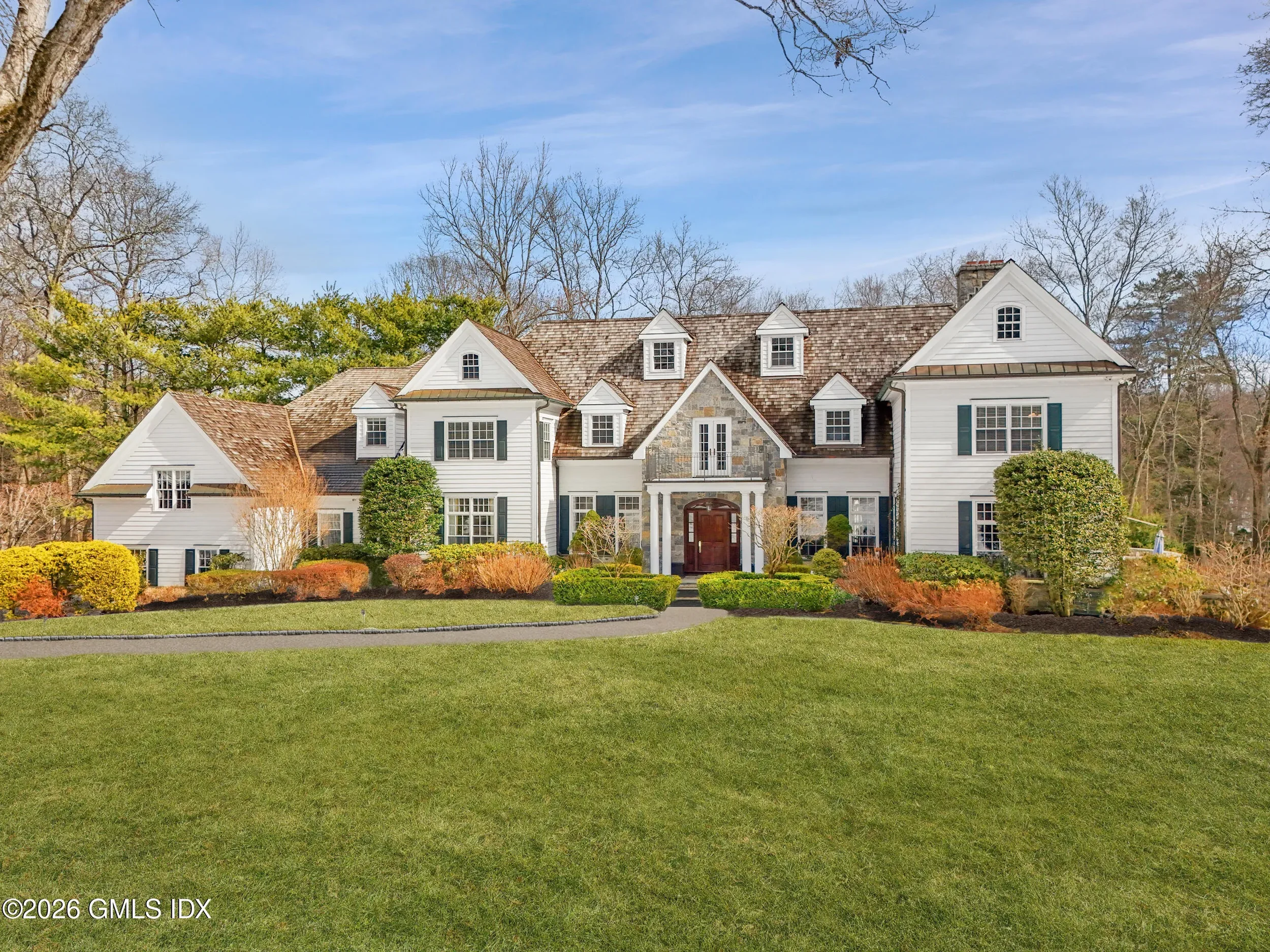 6 BEDS | 6 BATHS 2 HALF BATHS | 7,718 SQ. FT.  $8,880,000