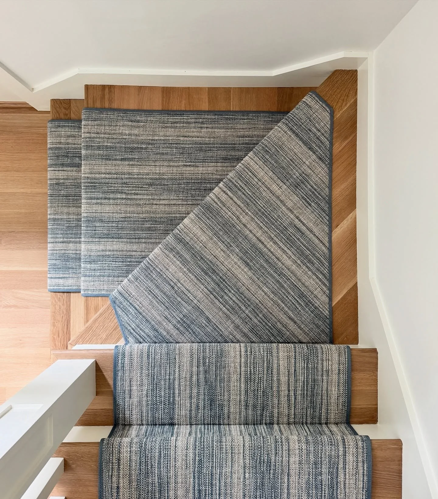 Turning the corner never looked so good -

Love how this stair runner turned out in our most recent summer home project