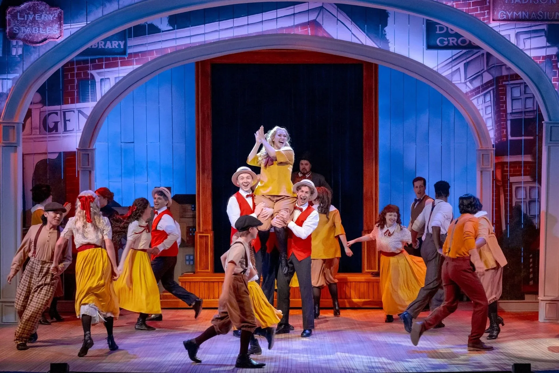 Ben Friesen's 'Jacey Squires', Dereck Atwater's 'Olin Britt', and Margot Frank's 'Ethel Toffelmier' do the Shipoopi!