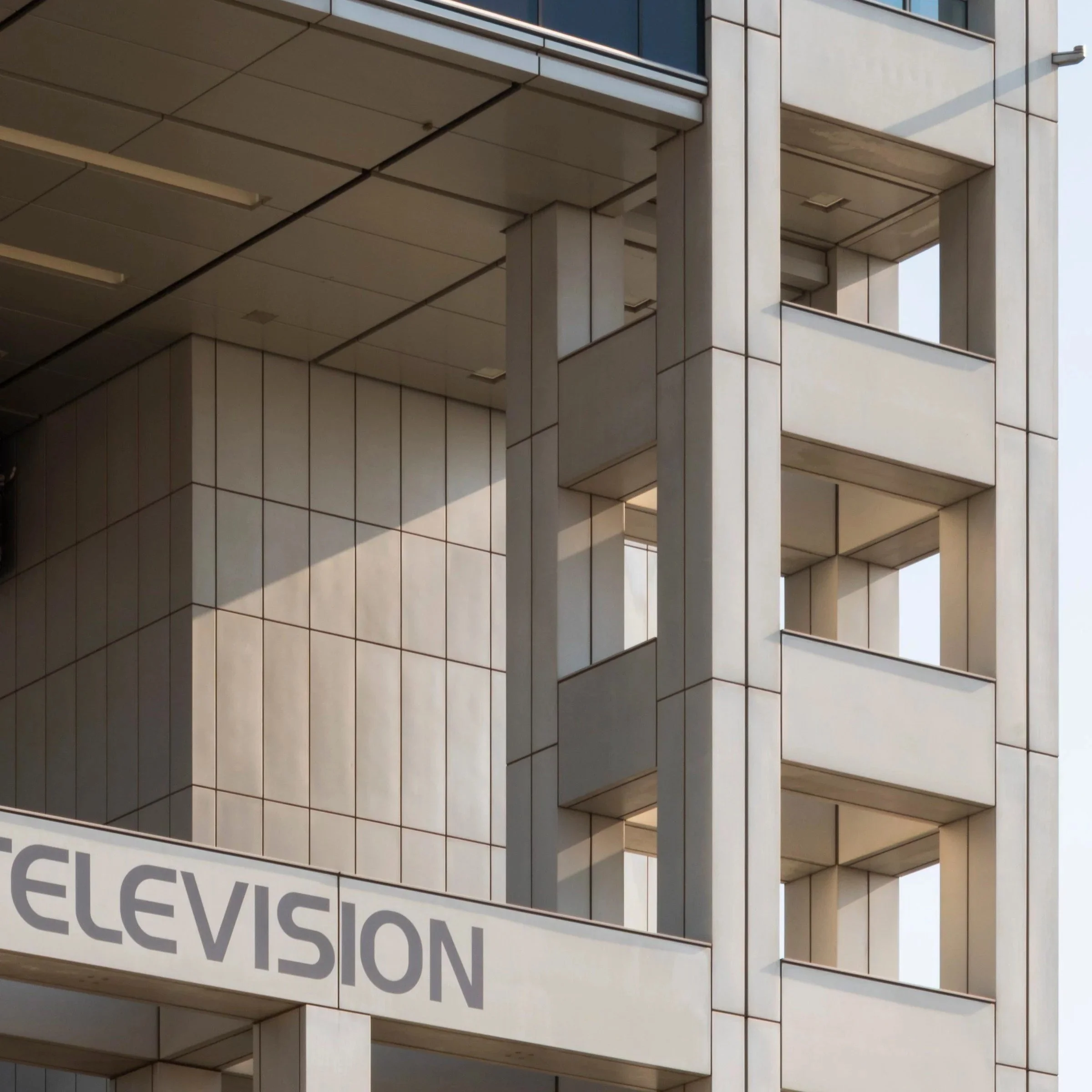Close-up of the FUJI TELEVISION lettering on the building's exterior, Fuji TV Headquarters, Odaiba, Tokyo, Japan