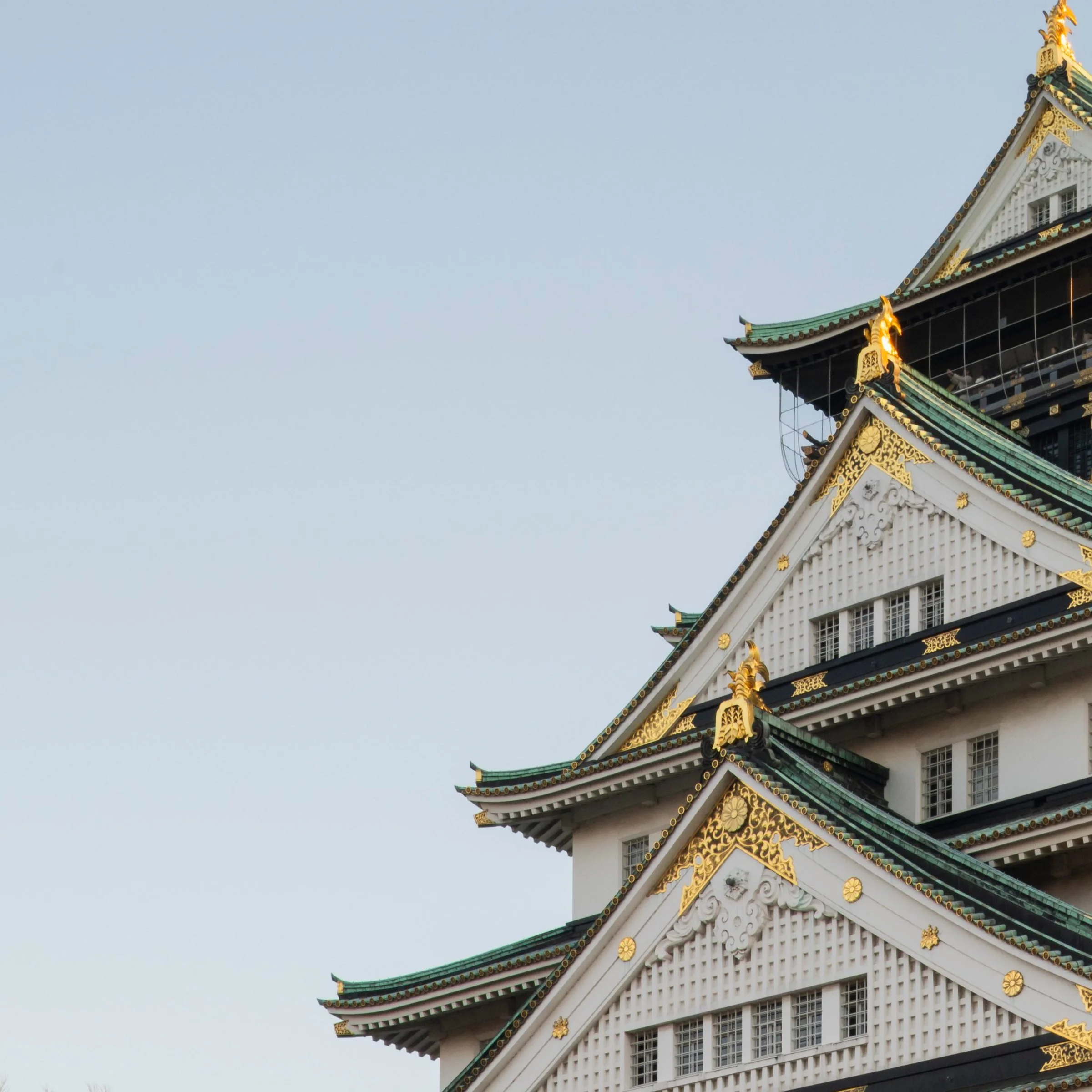 Osaka Castle's tiered roofline against the evening sky, Osaka, Japan