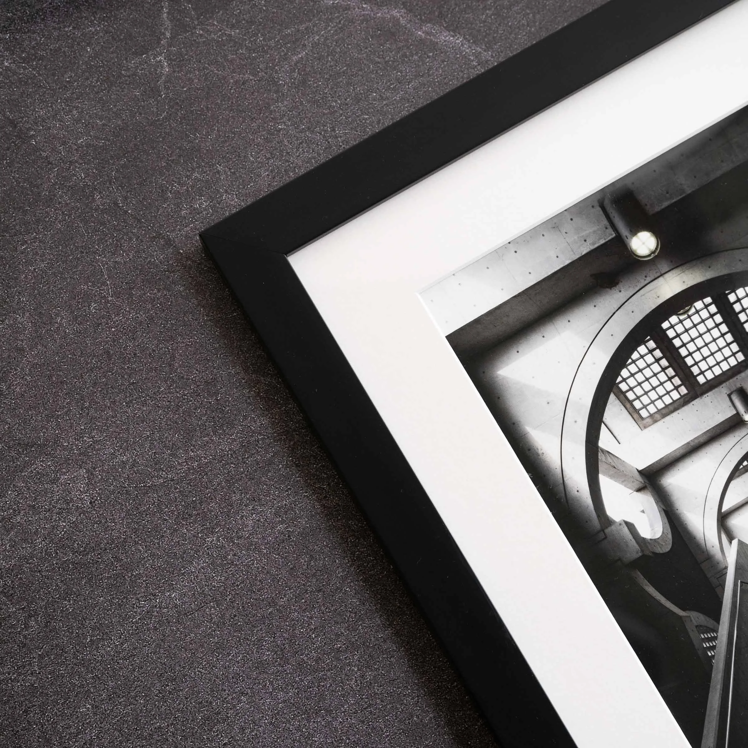 Black timber frame with white matte finish on a fine art photography print