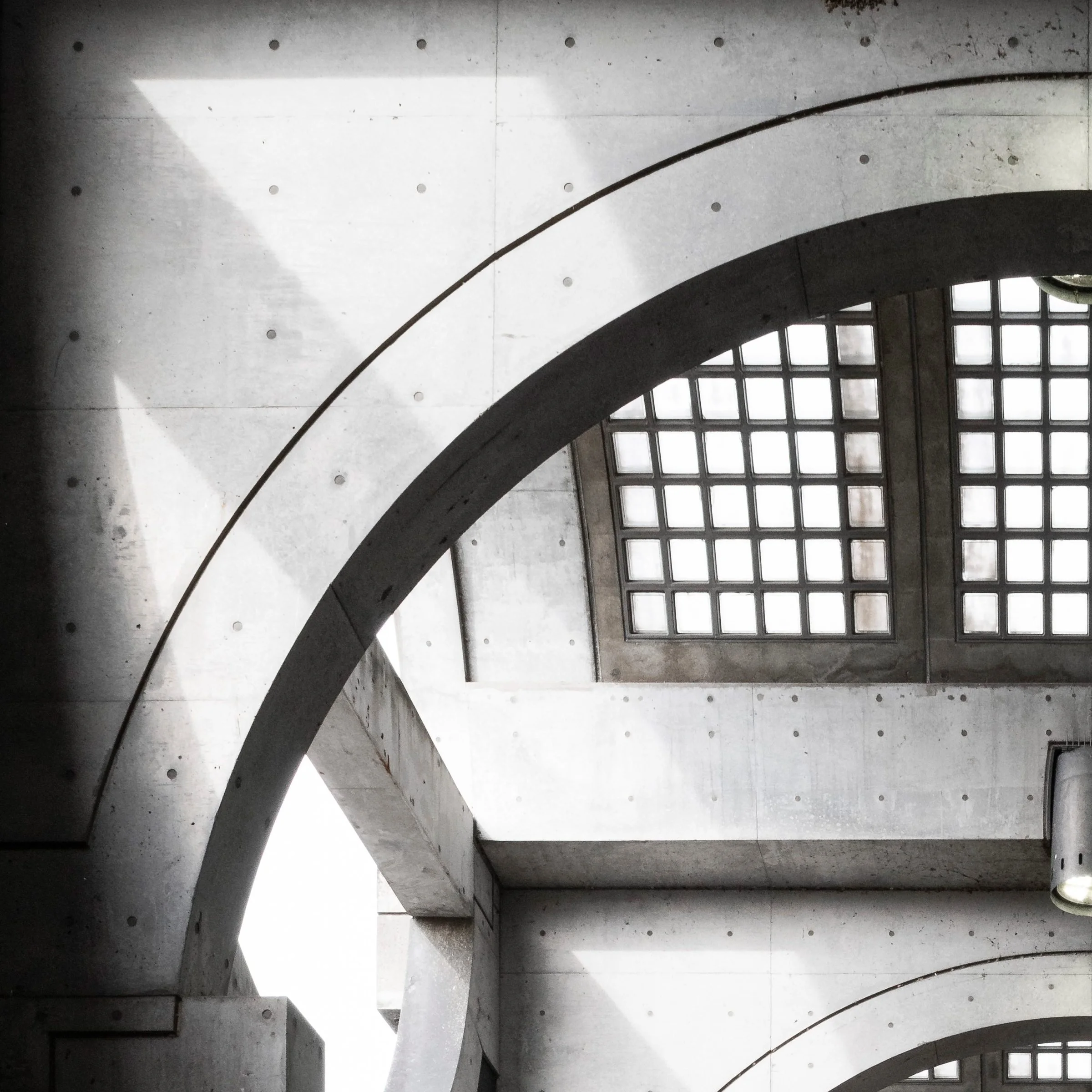 Top left zoom detail of the Twisted Mansion print, arched concrete vault at Keihan Uji Station, Kyoto, Japan