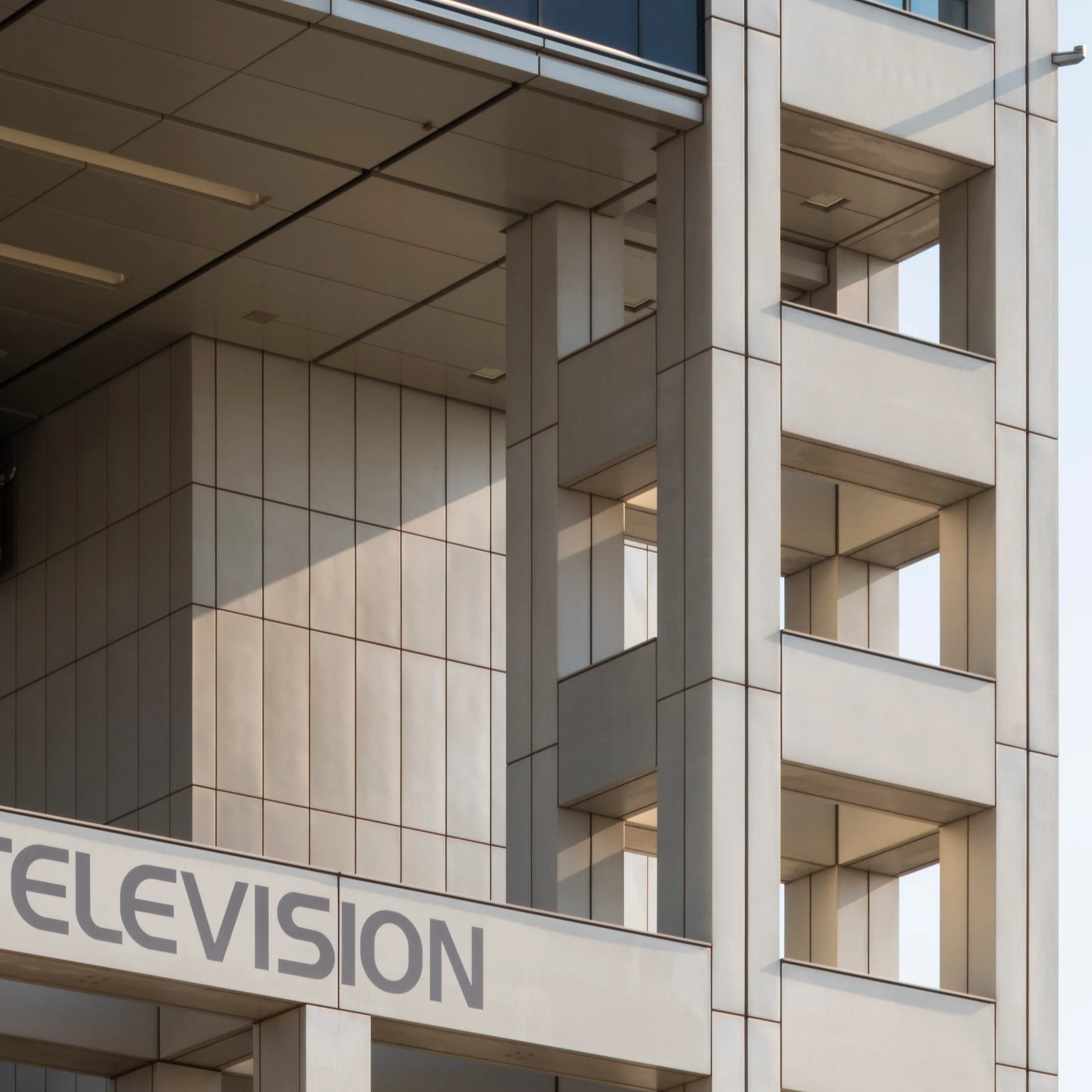 Close-up of the FUJI TELEVISION lettering on the building's exterior, Fuji TV Headquarters, Odaiba, Tokyo, Japan