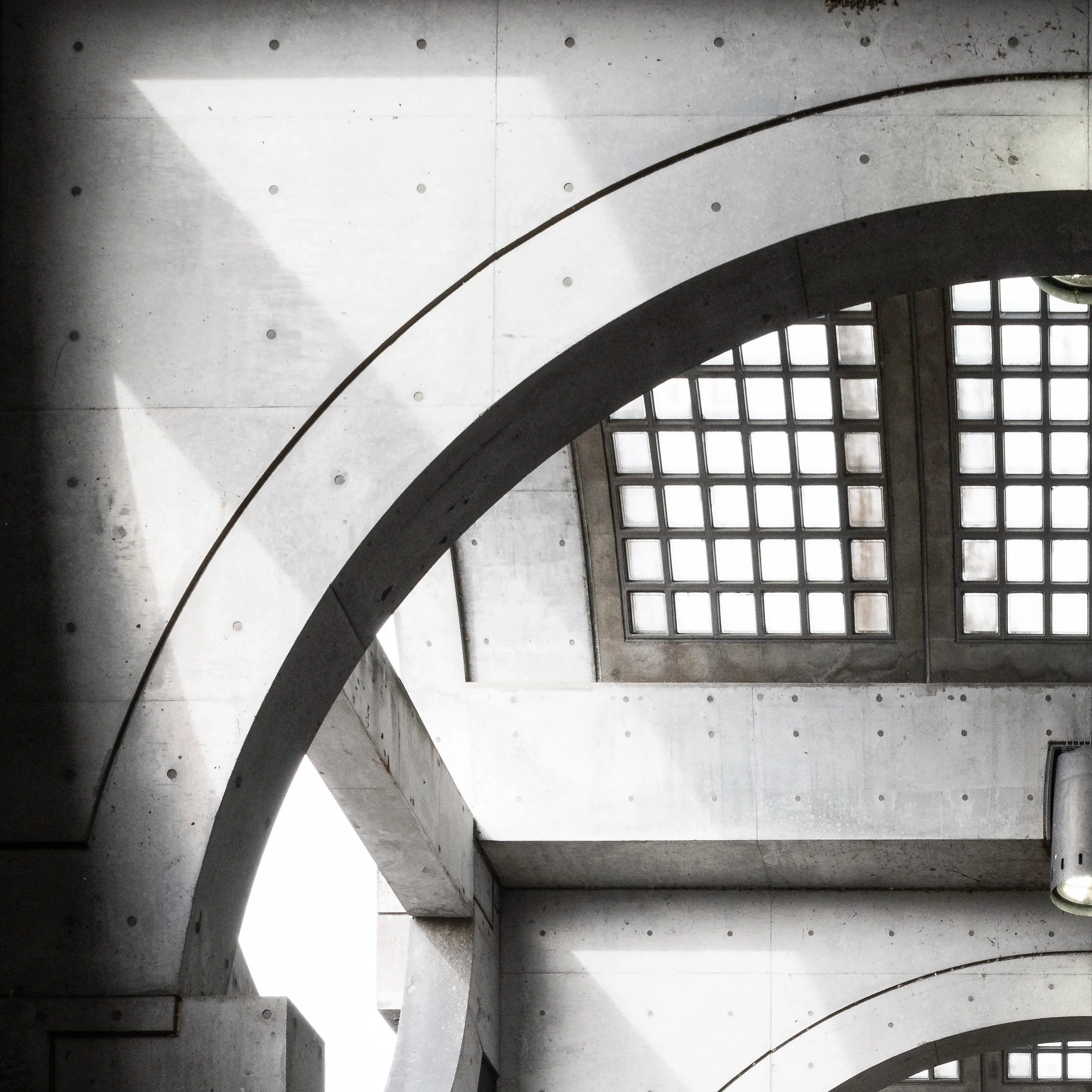 Top left zoom detail of the Twisted Mansion print, arched concrete vault at Keihan Uji Station, Kyoto, Japan