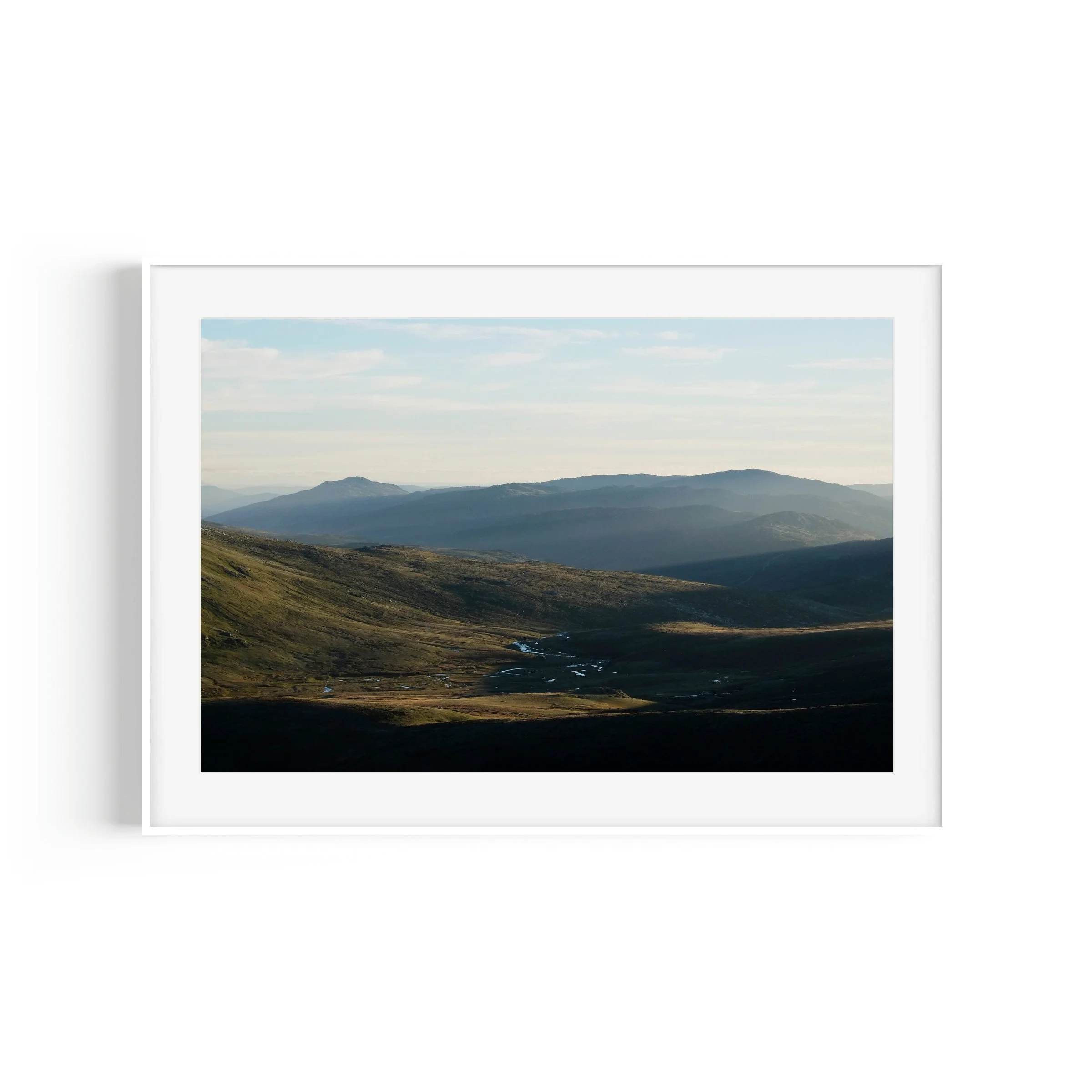 First Rays Mount Kosciuszko Snowy Mountains New South Wales landscape print in white frame by Matthew Sherren