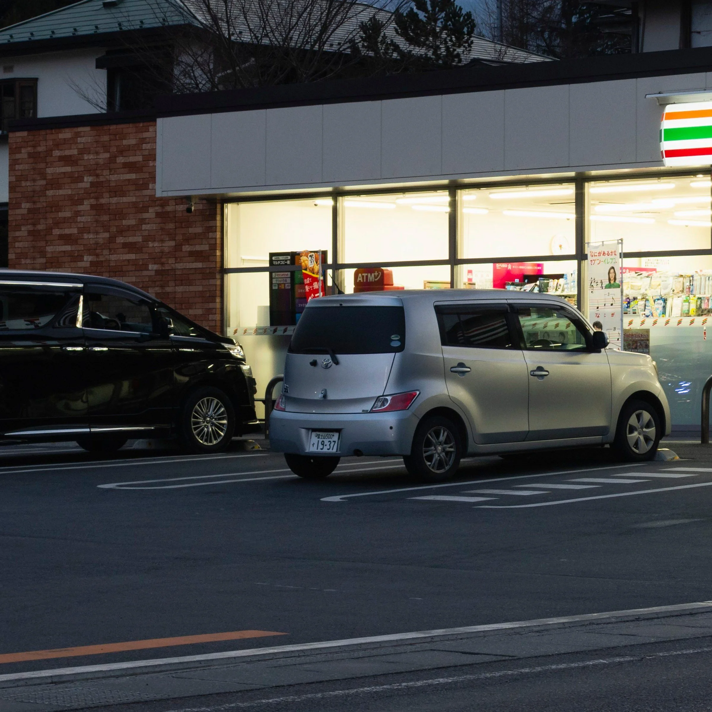 Van parked outside the convenience store at dusk, Fujiyoshida, Japan