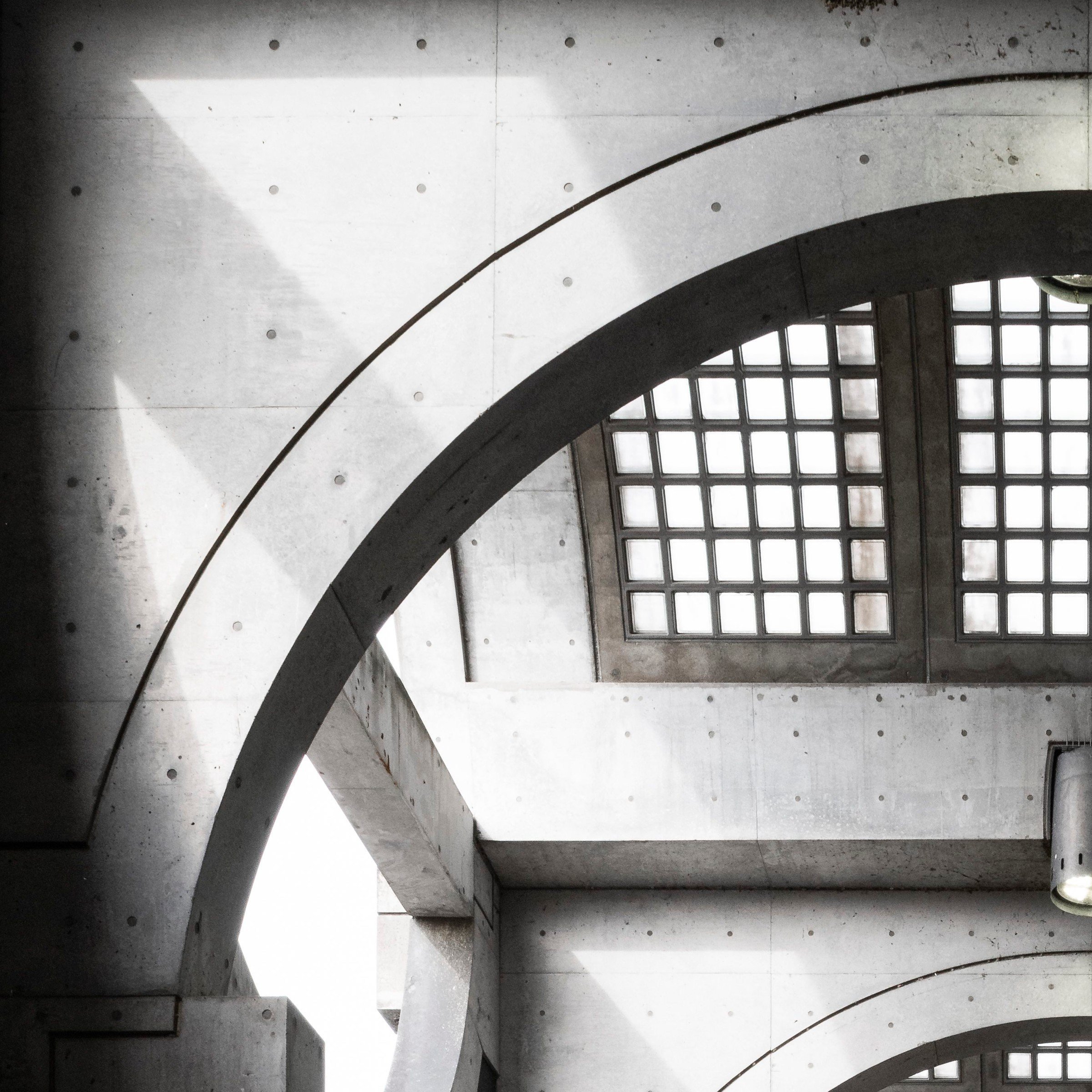 Top left zoom detail of the Twisted Mansion print, arched concrete vault at Keihan Uji Station, Kyoto, Japan