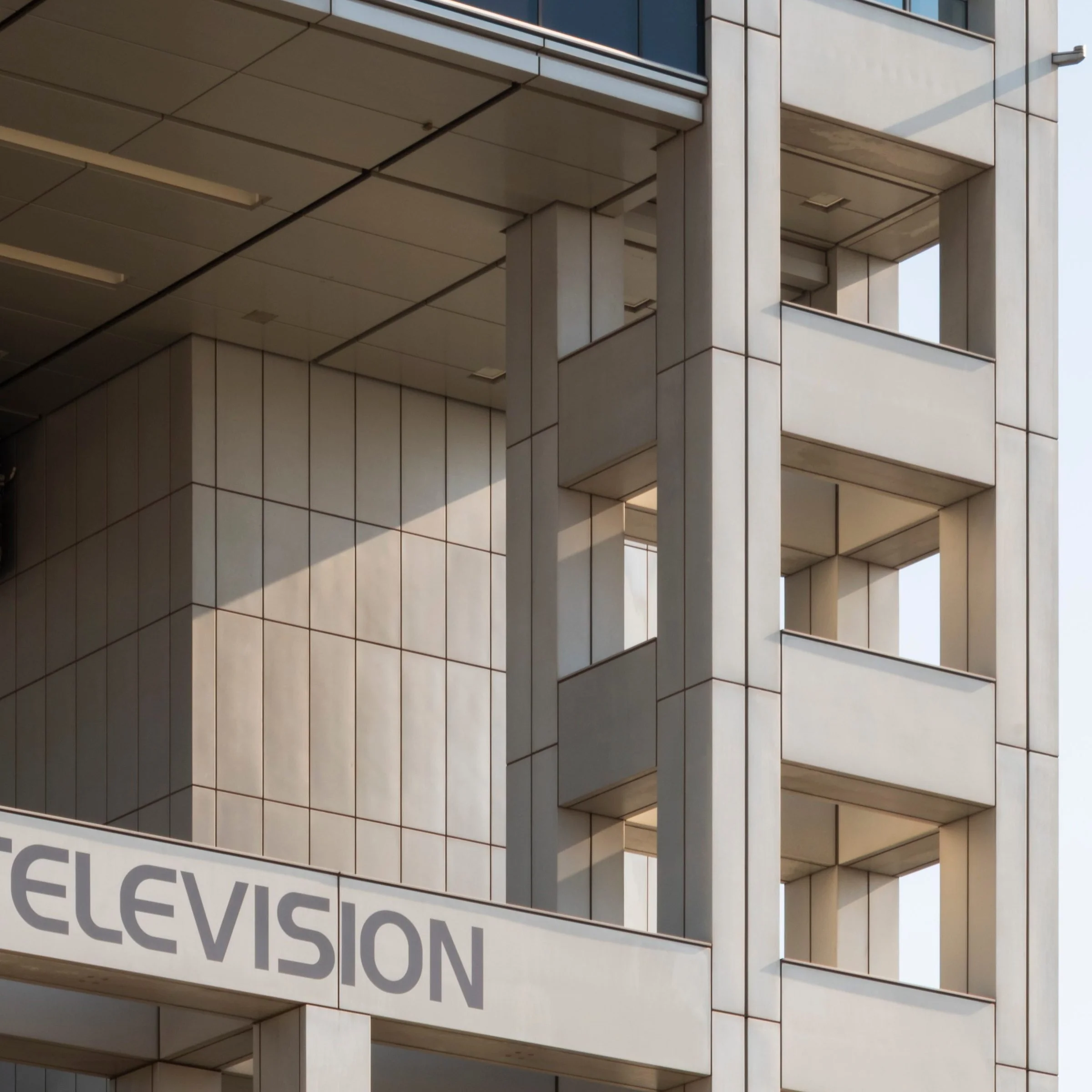 Close-up of the FUJI TELEVISION lettering on the building's exterior, Fuji TV Headquarters, Odaiba, Tokyo, Japan