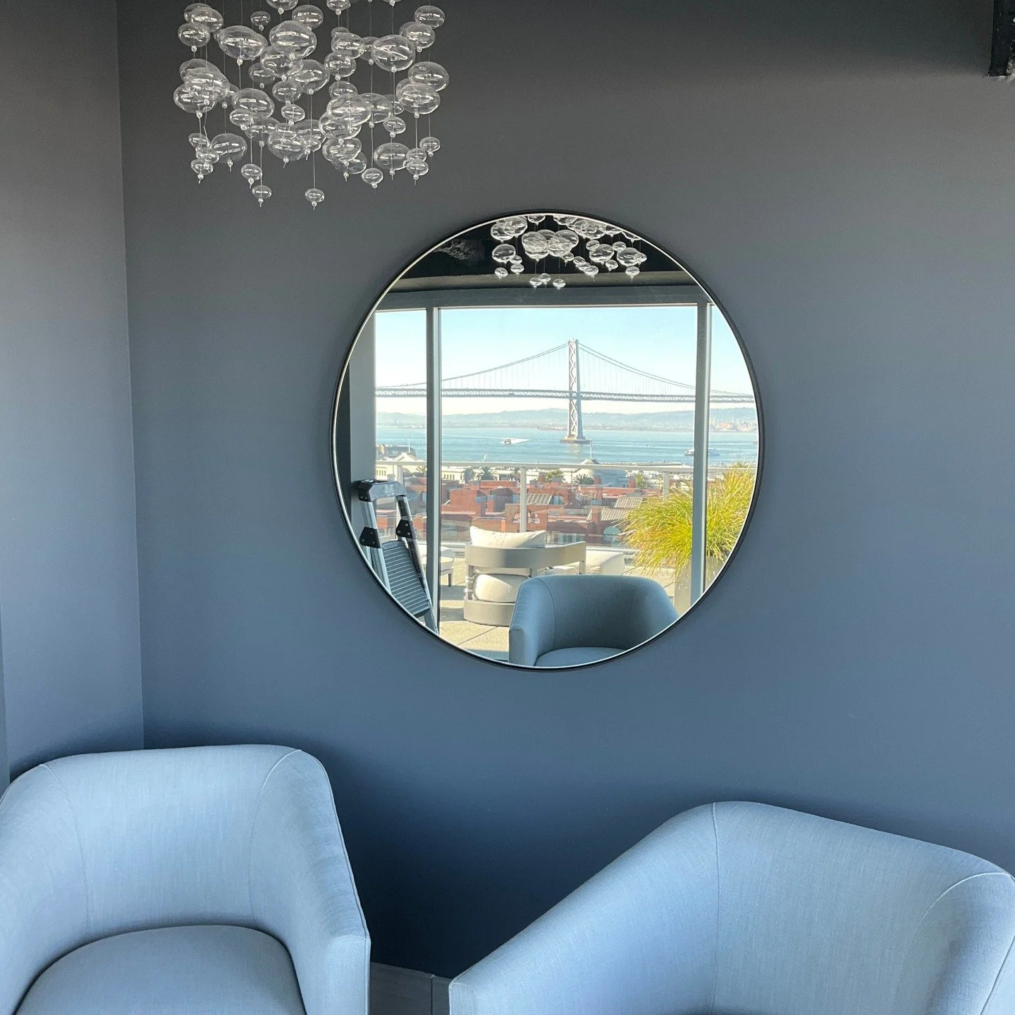 Reflections that do more than mirror&mdash;bending light, opening space, and turning every angle into a statement. ✨🪞

 Work Of Art is proud to offer specialty mirror installations, because in great design, even the reflection deserves its moment.