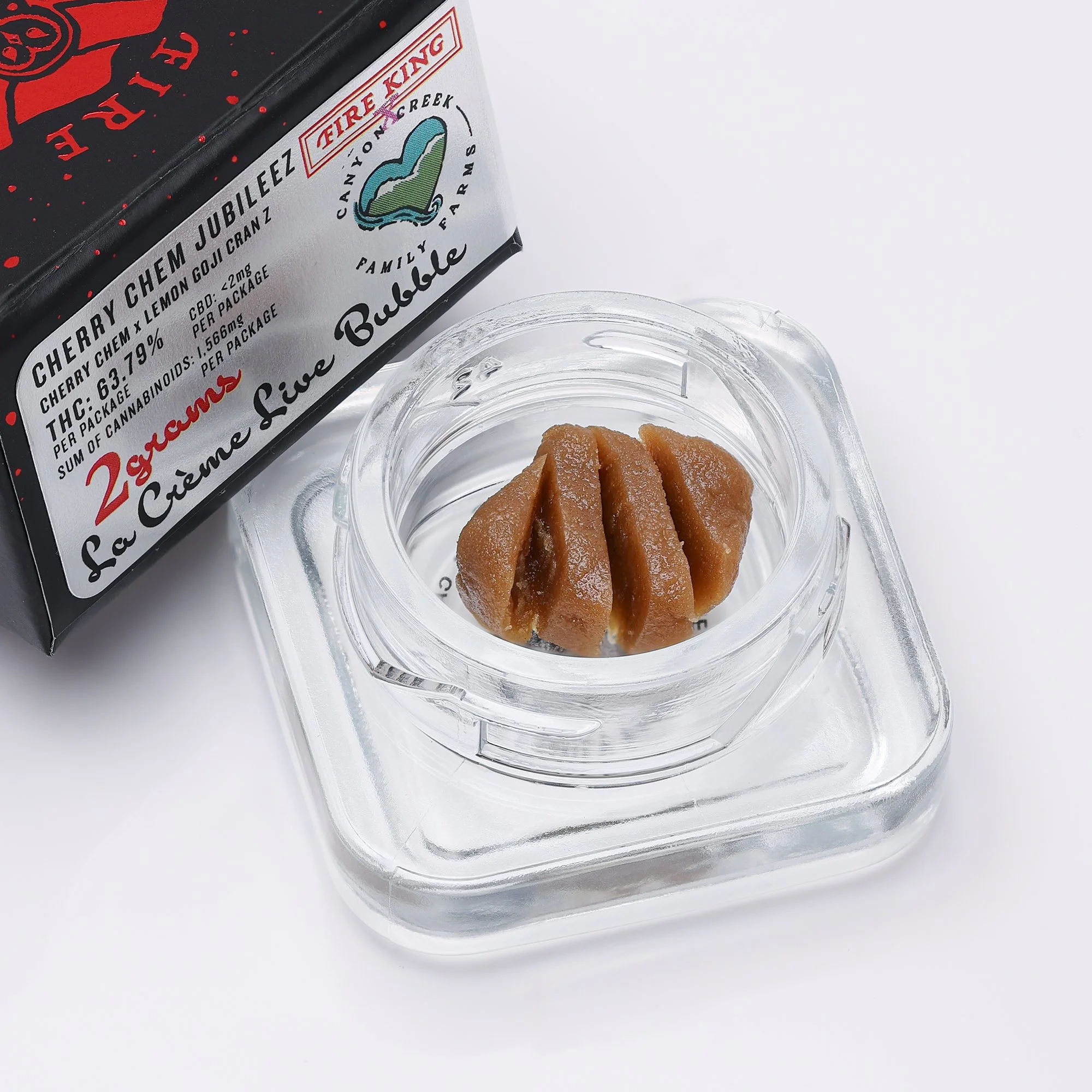 A closeup of Fire King La Creme, Cold Cured Live Bubble
