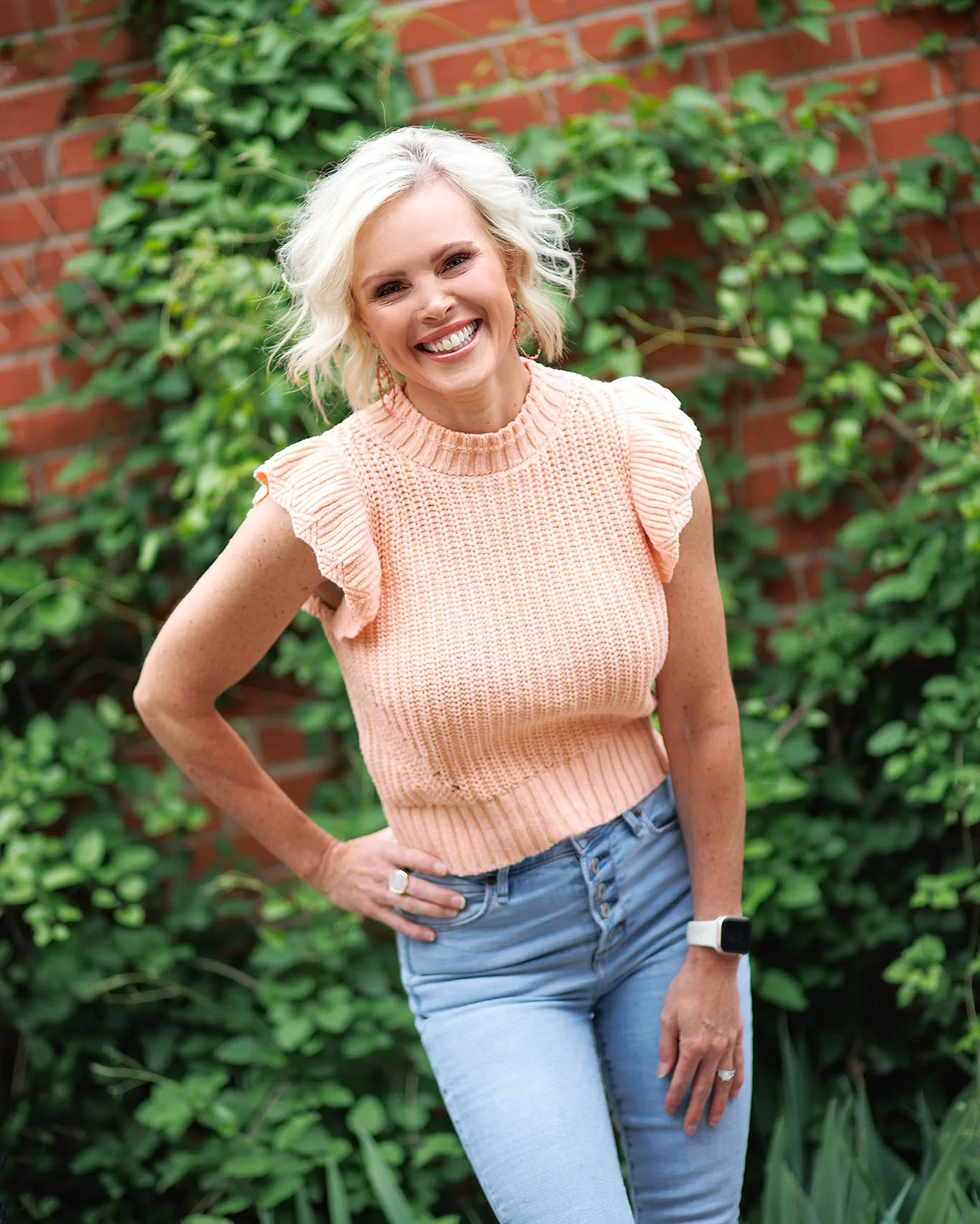 Professional Headshot of woman in peach sweater