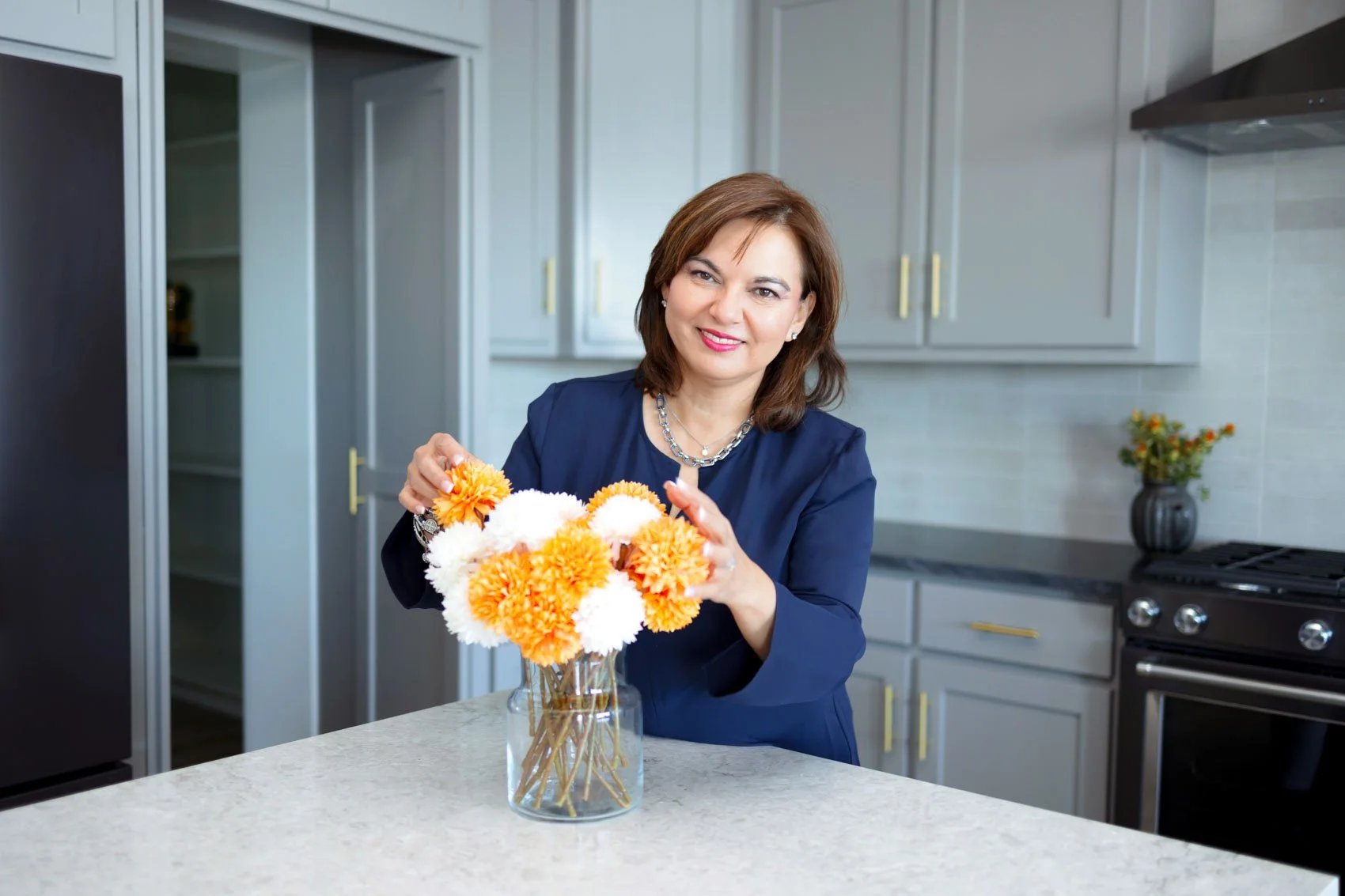Branding Photo of Realtor arranging flowers