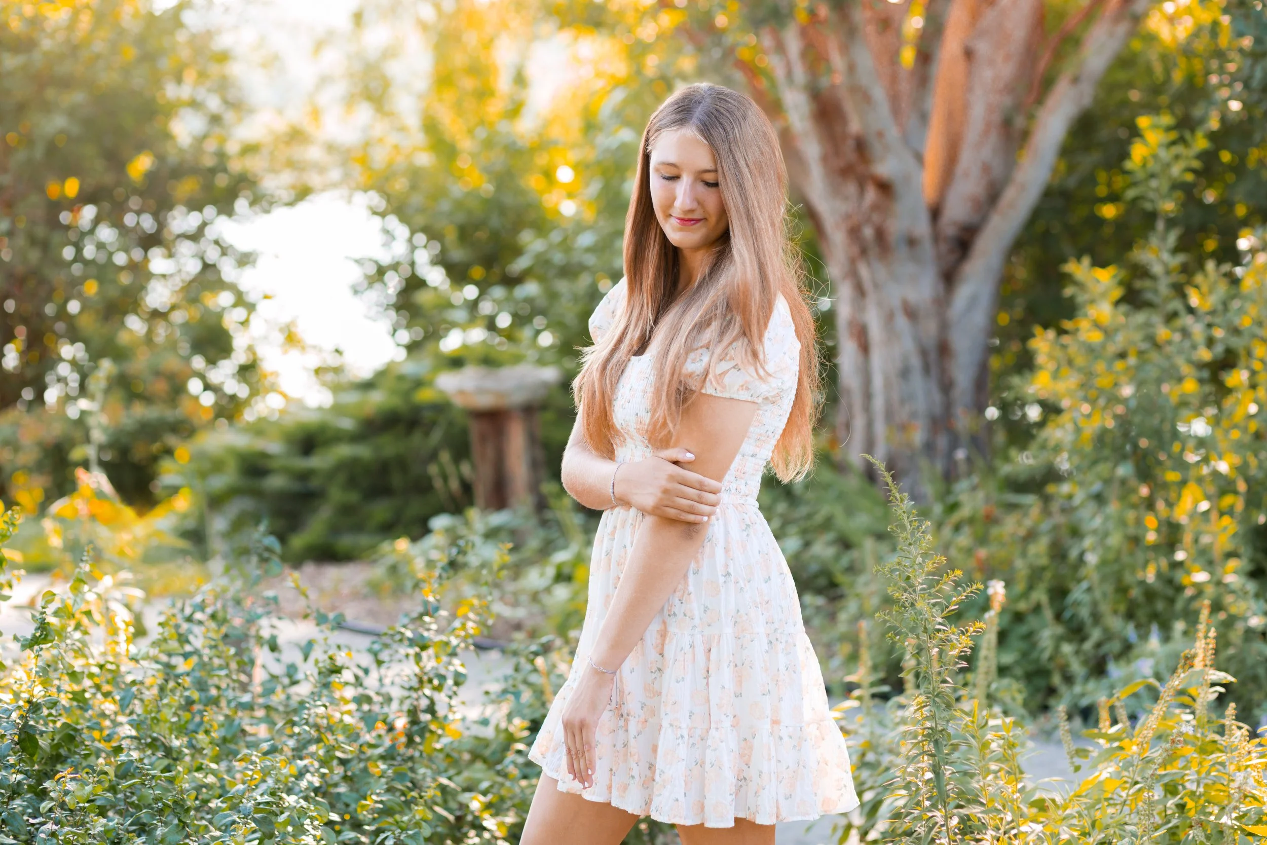 senior photo of girl in a garden at Walnut Creek, Papillion NE