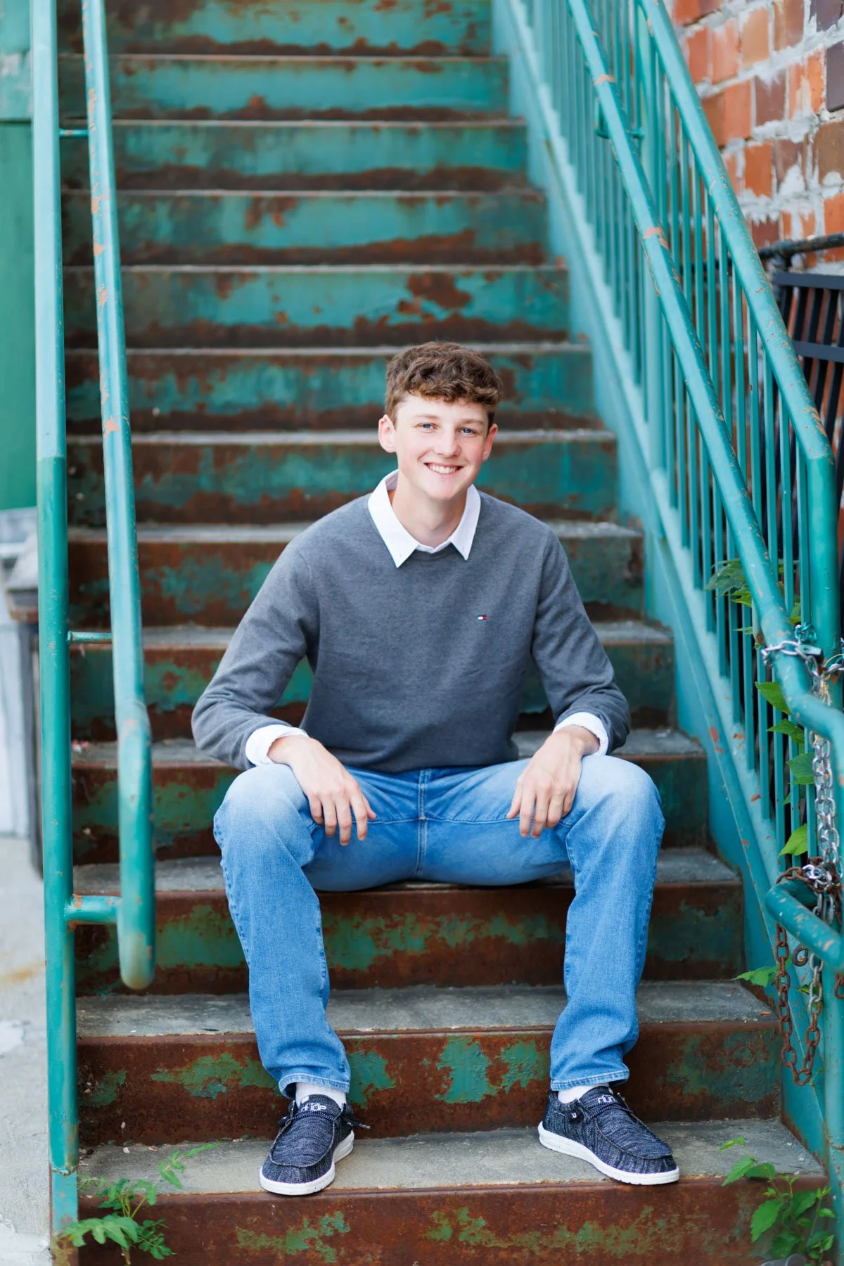 Senior Photo of Boy on green Stairs