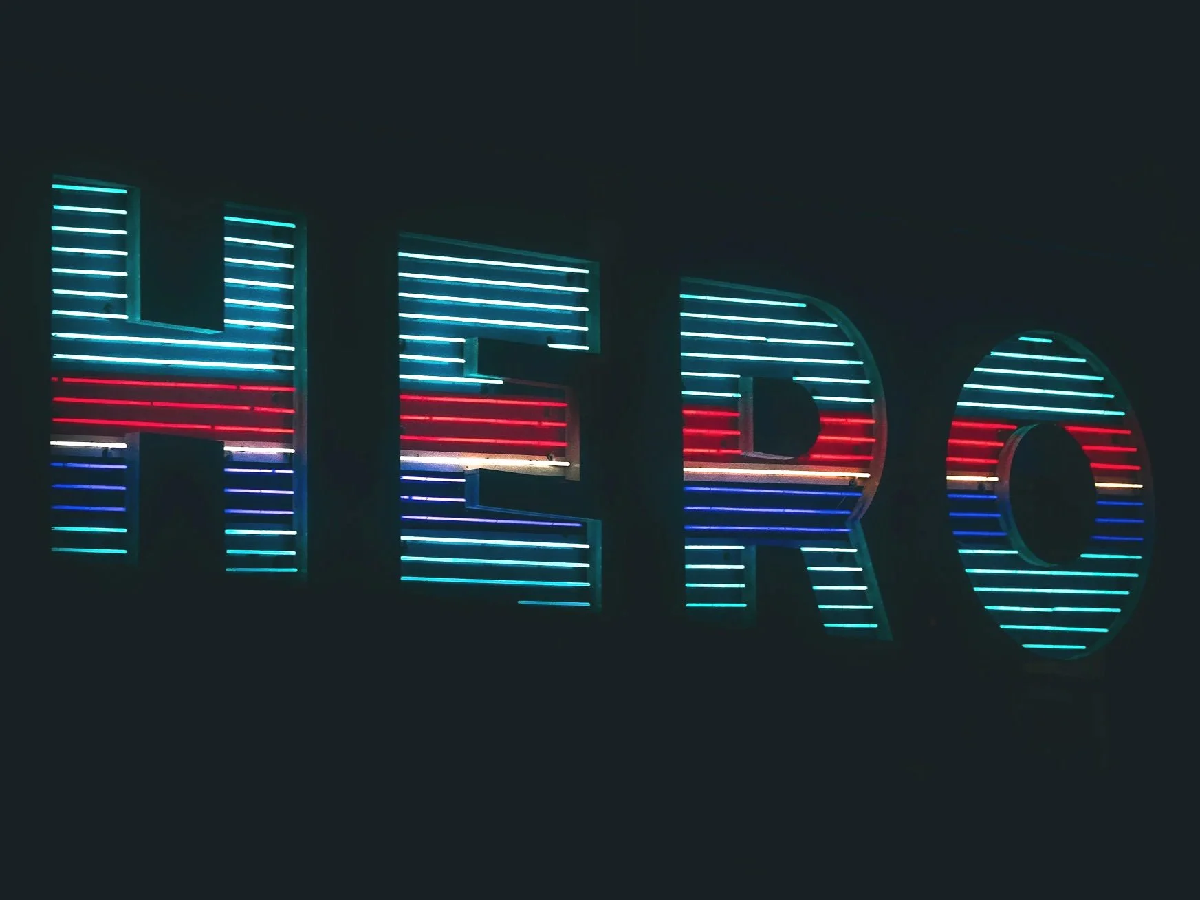 A neon sign that reads, "Hero"