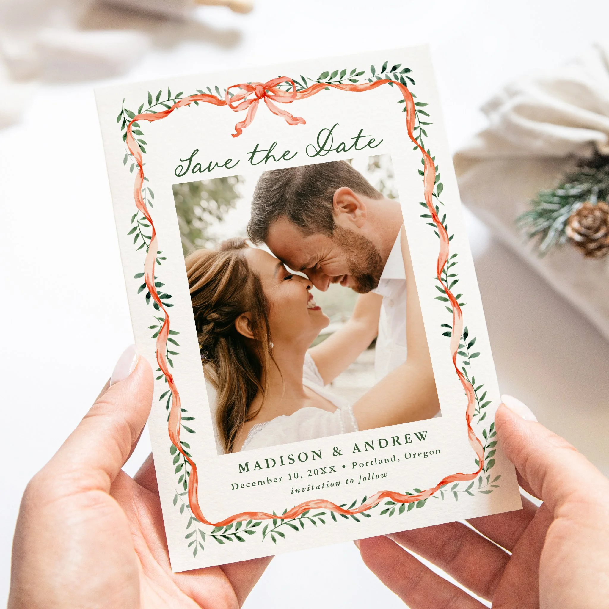 late-bloom-paperie_weddings_save-the-dates_elegant-red-ribbon-greenery-holiday_handheld-card_white.jpg