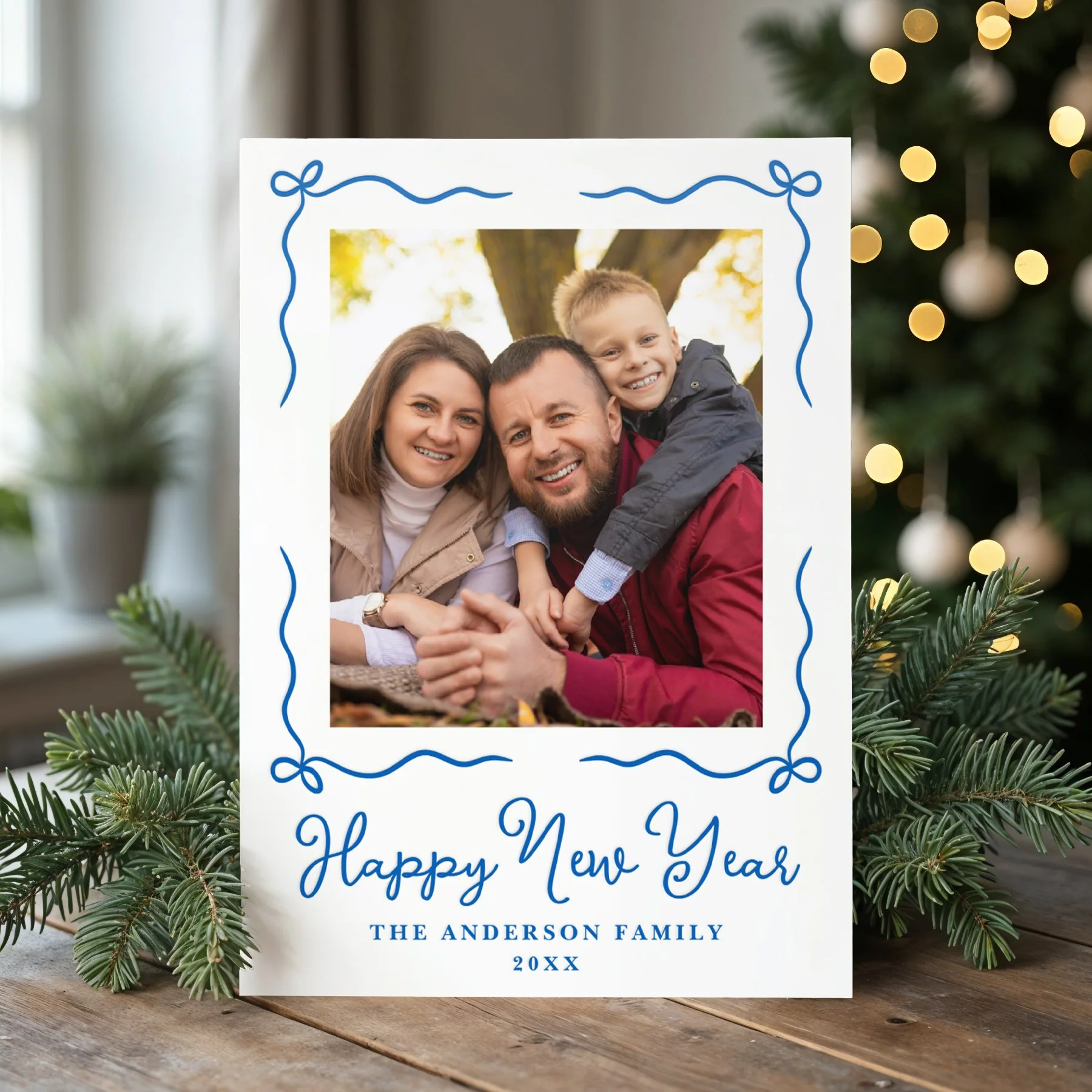 late-bloom-paperie_Christmas_letterpress-photo-cards_whimsical-green-bow-frame_happy-new-year_blue.jpg