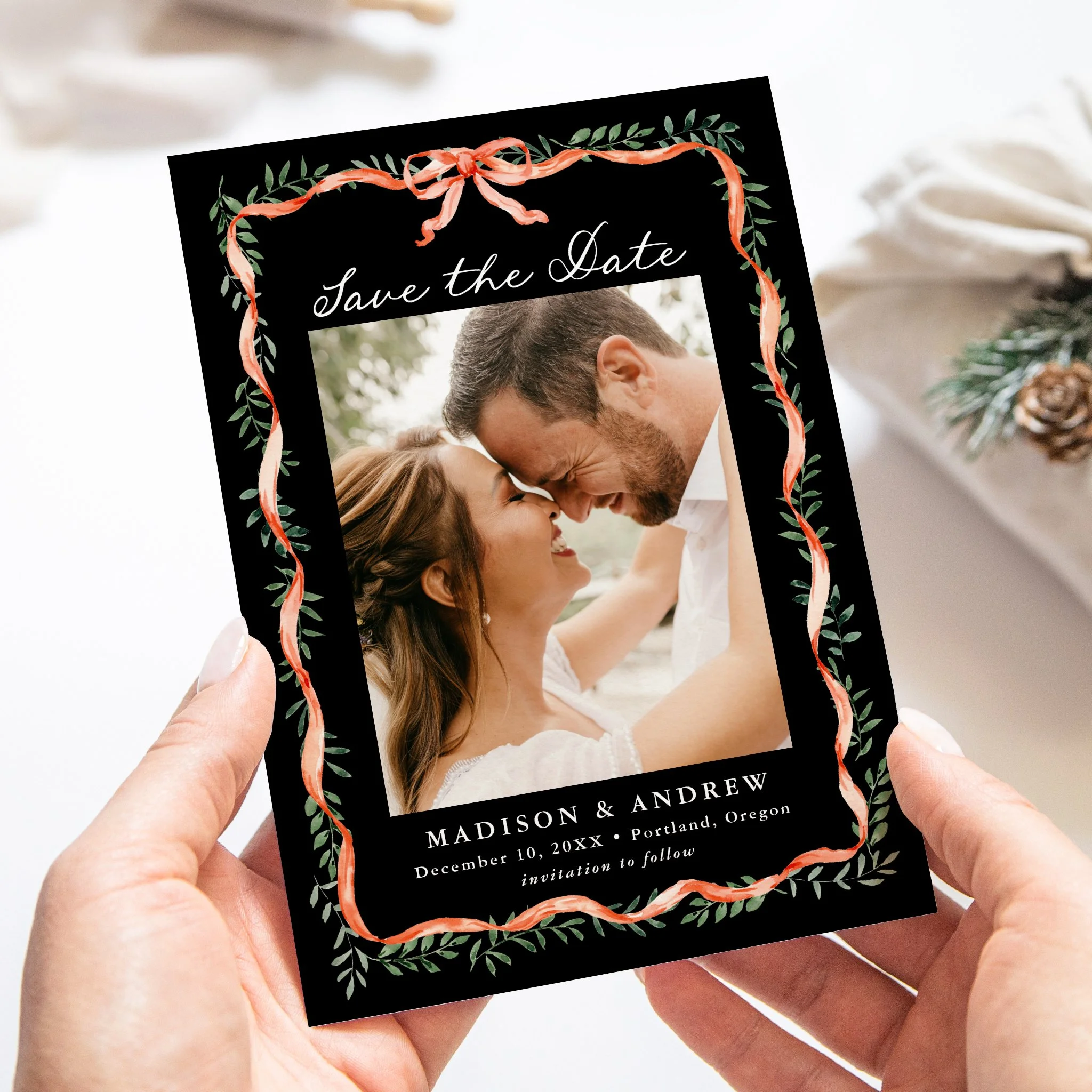 late-bloom-paperie_weddings_save-the-dates_elegant-red-ribbon-greenery-holiday_handheld-card_black.jpg