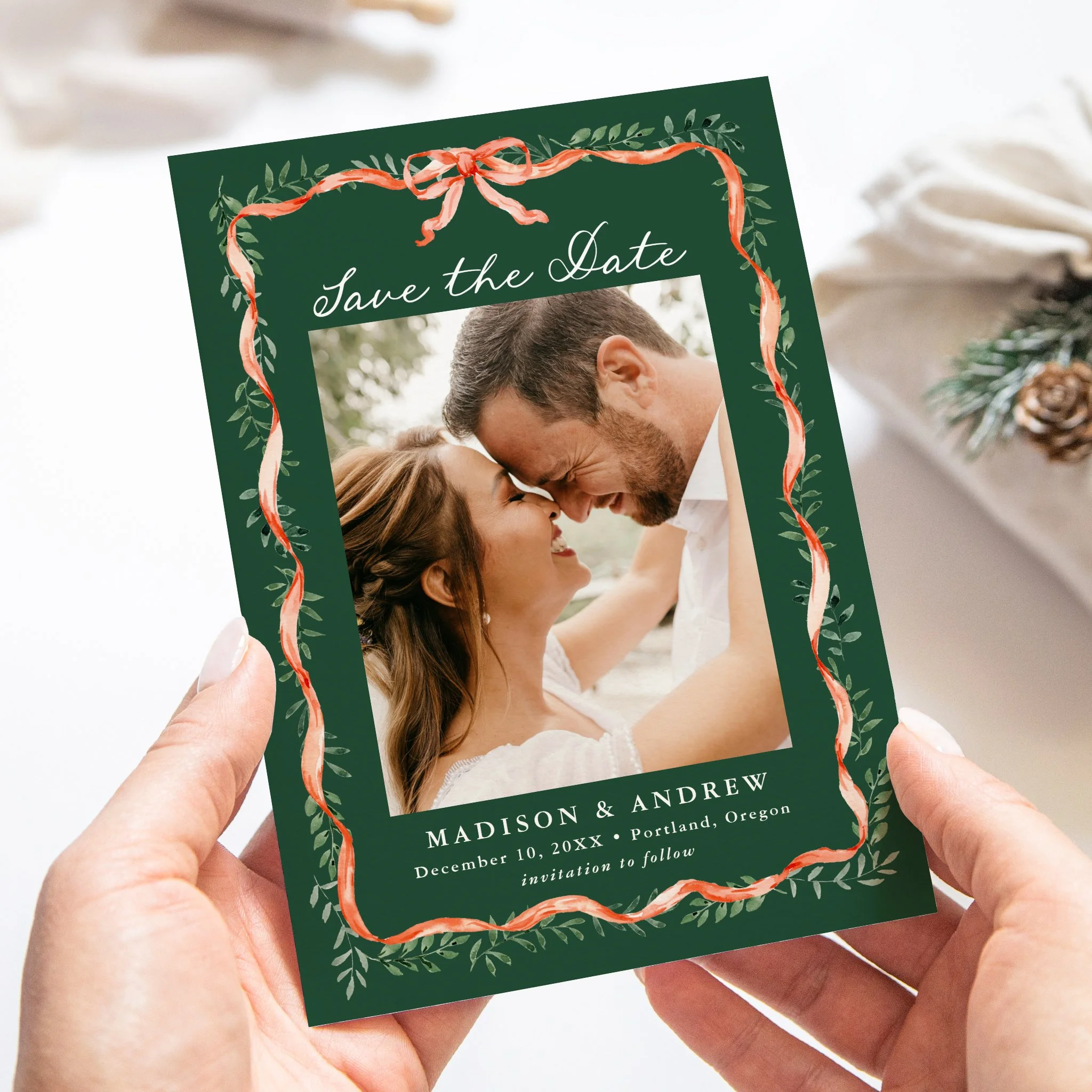 late-bloom-paperie_weddings_save-the-dates_elegant-red-ribbon-greenery-holiday_handheld-card_green.jpg