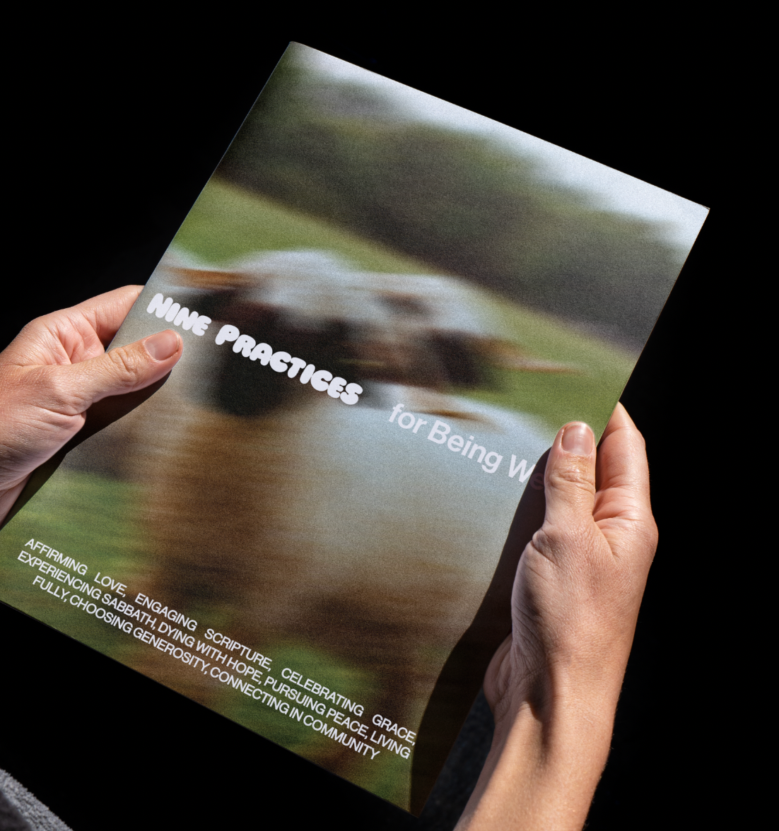 Hands holding a booklet titled 'Nine Practices for Being Well' with a blurred background image of a person running.