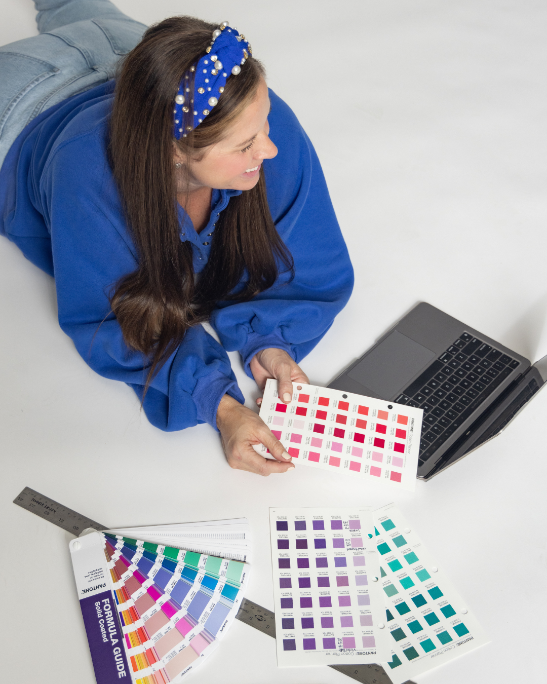 This is an image of Amanda Rango of ARD Fashion Consulting working with color palettes for fashion apparel brands
