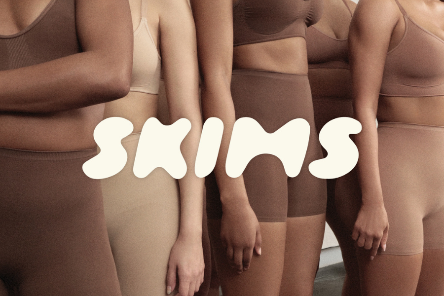 SKIMS logo and product images on model