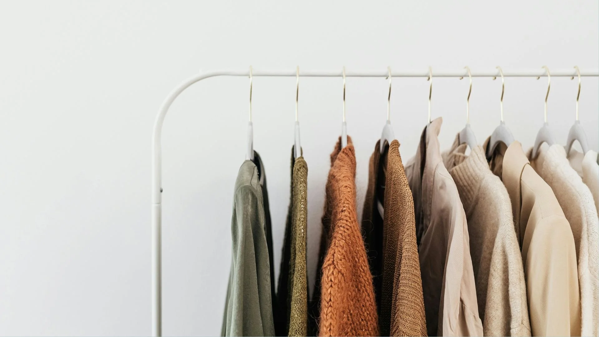 This is an image of clothing hanging on a clothing rack.