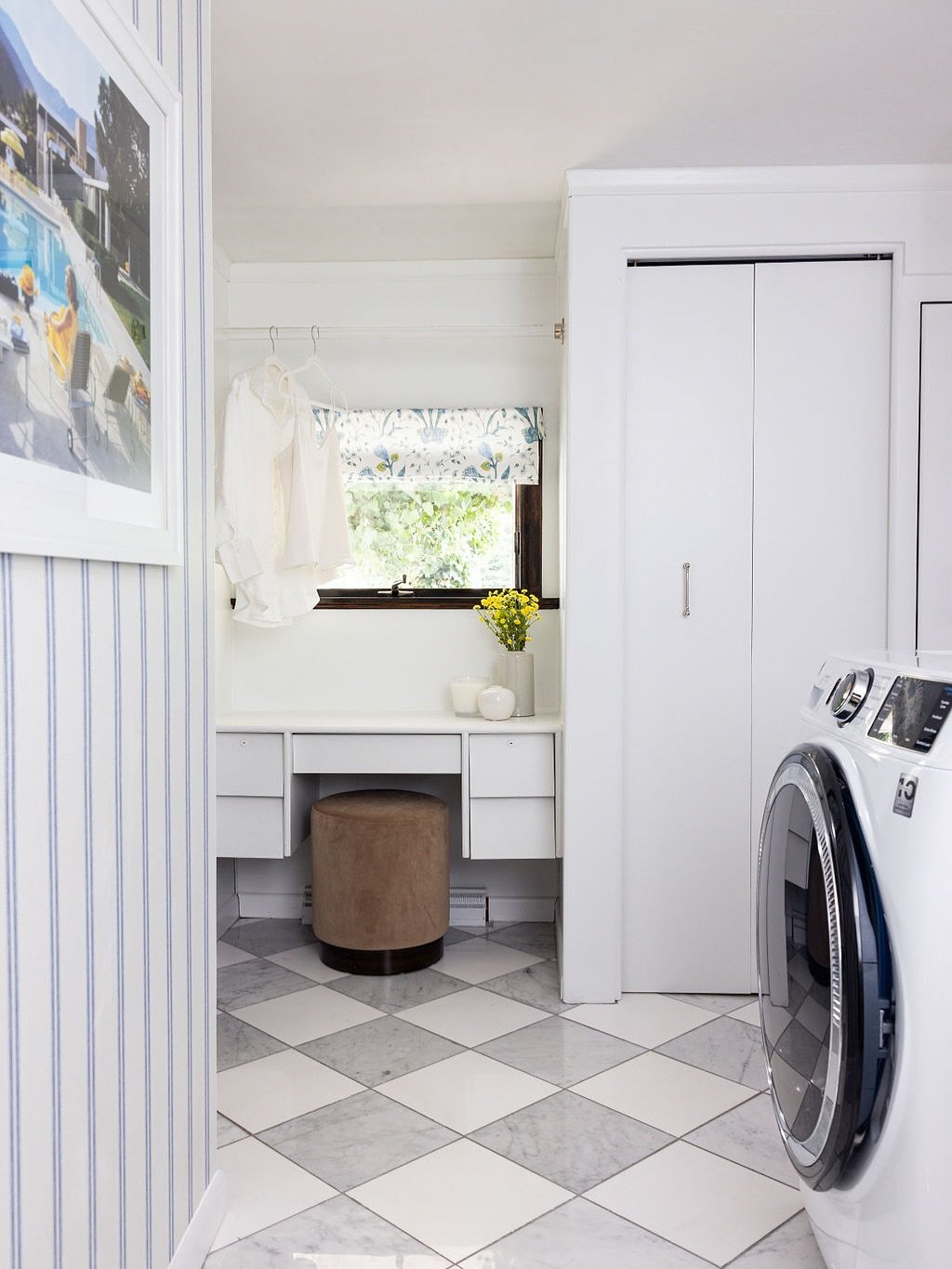 Laundry is boring, but your laundry room shouldn&rsquo;t be. 

Tucked between a bold green powder bath and a soft blue kitchen, this laundry room was designed as a visual breather - simple, but never dull. The checkerboard floor sets a classic founda