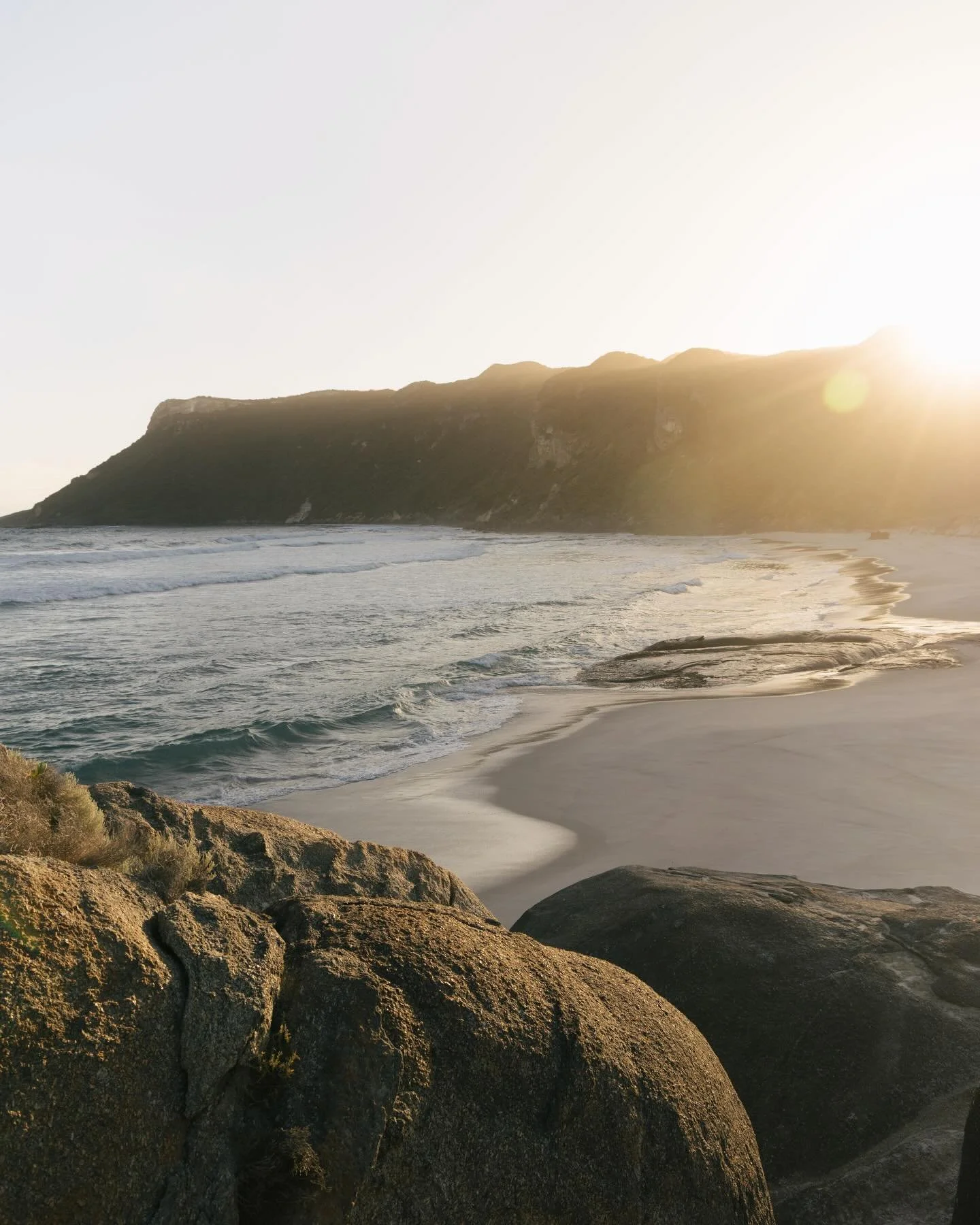 After a long day on the road pulling into this place was something special. A windy soft sand track led towards the beach with the sun starting to set, lighting up the horizon with the salt water spray. We made it just in time to get on to the beach 