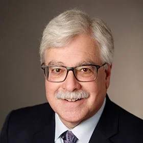 Dr. Lawrence Picus