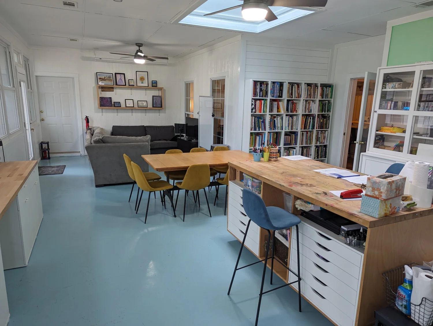 Shared tables and books at an earlier Academic Orchard classroom