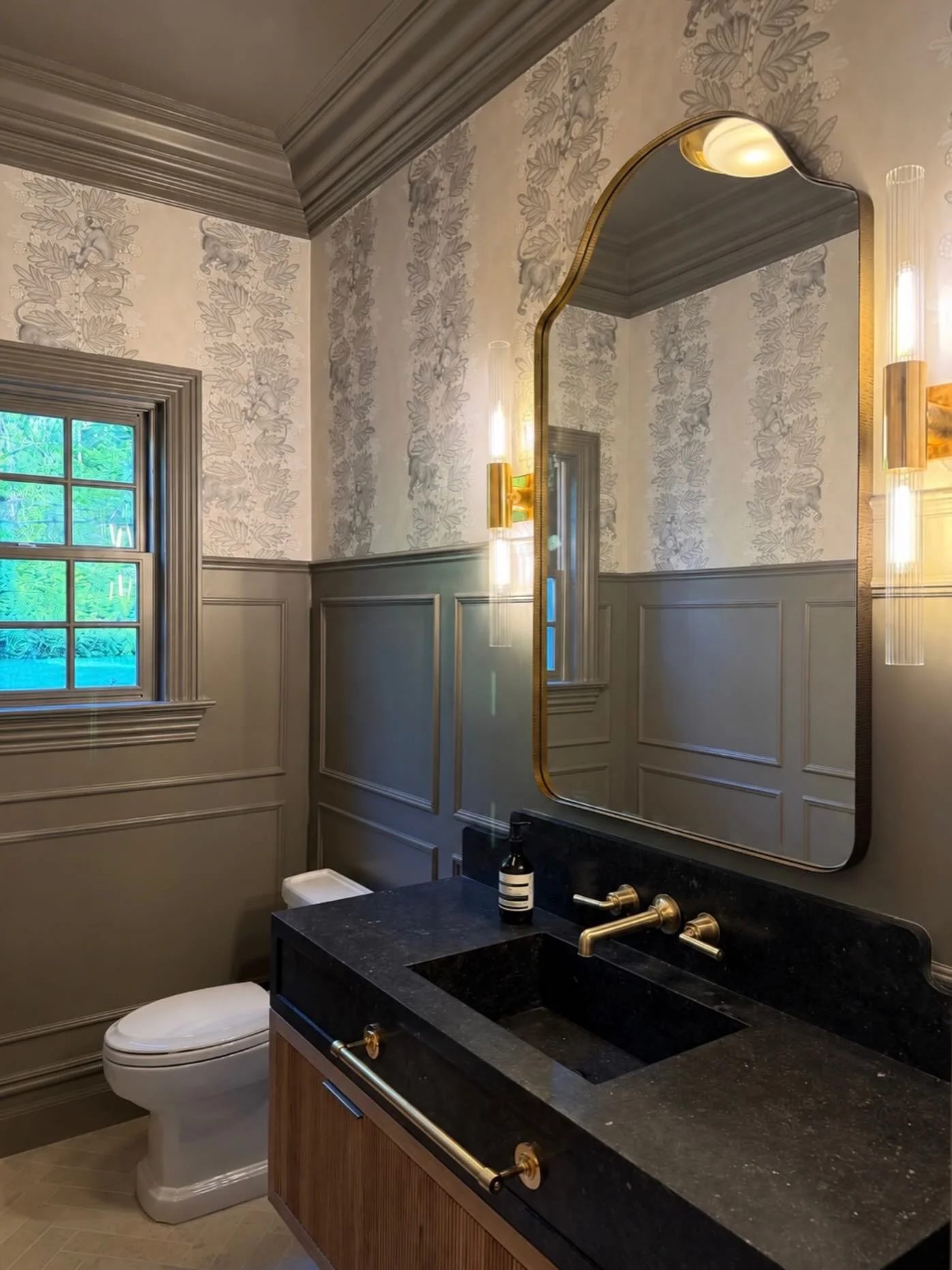 For this joyful and loving family, we designed a powder bath that feels formal but embraces their whimsy.  Can you spot the 🐵??

Builder: @derosa_builders 
Interior Design: @kategelfandid