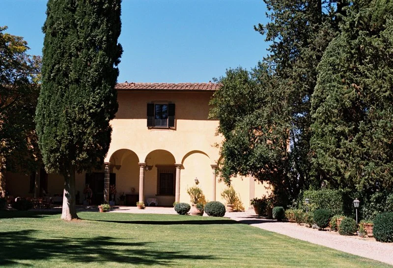 Renaissance loggia at Villa Il Poggiale with a cypress tree