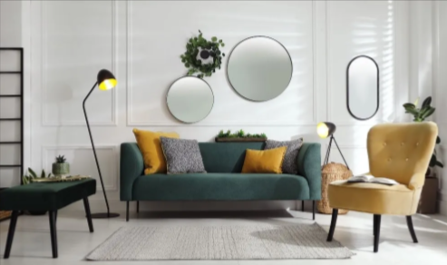Modern living room showcasing furniture upholstery, Maui transformation by Maui Upholstery Service, with an elegant sofa and chairs.