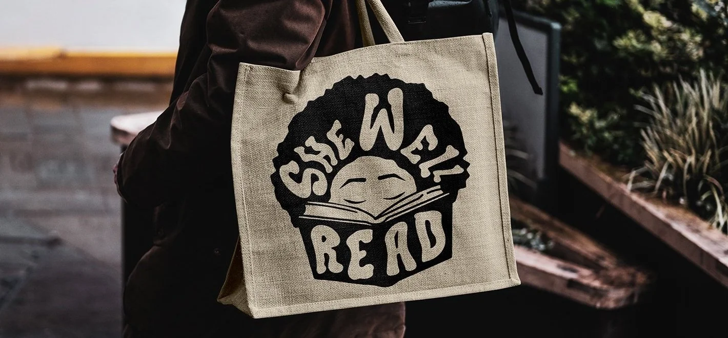 Bag+Carrying+by+Man+Mockup+2.jpg