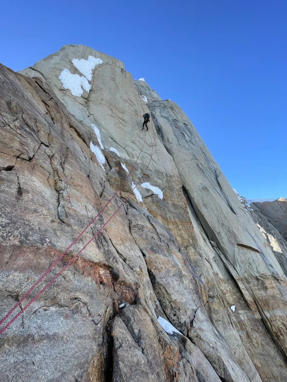 Rappeling down the Haston crack. Note the melted rime. (Photo: Colin Haley)