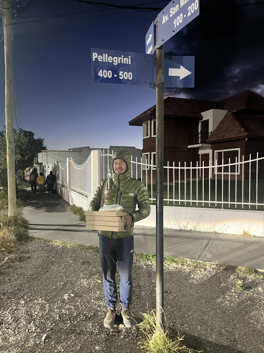 Thomas standing in front of a sign that put a big smile on my face