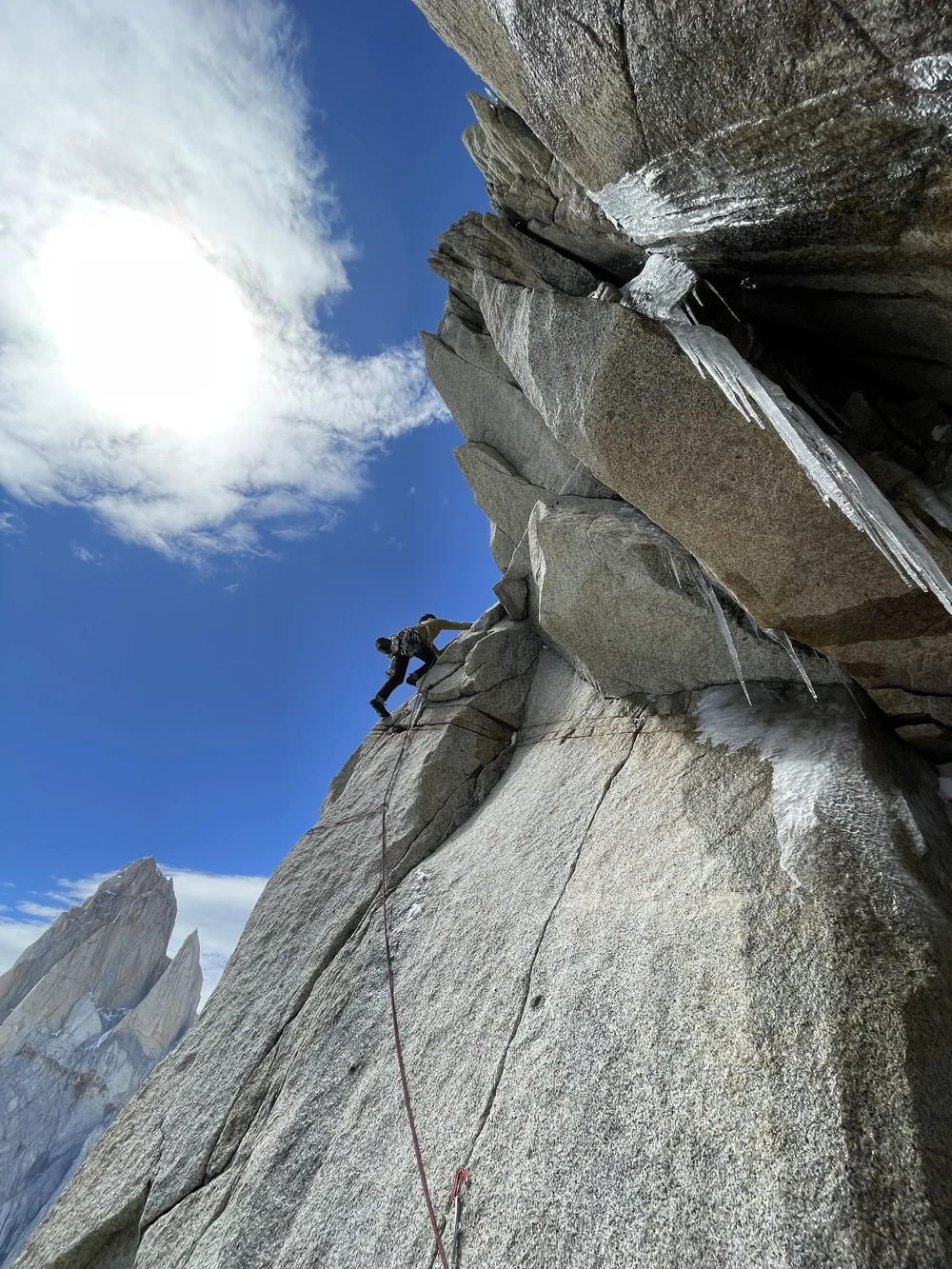 Climbing up the arete. I honestly wouldn't recommed going this way to those looking to climb the route. There is an easier way the opposite direction. (Photo: Colin Haley)