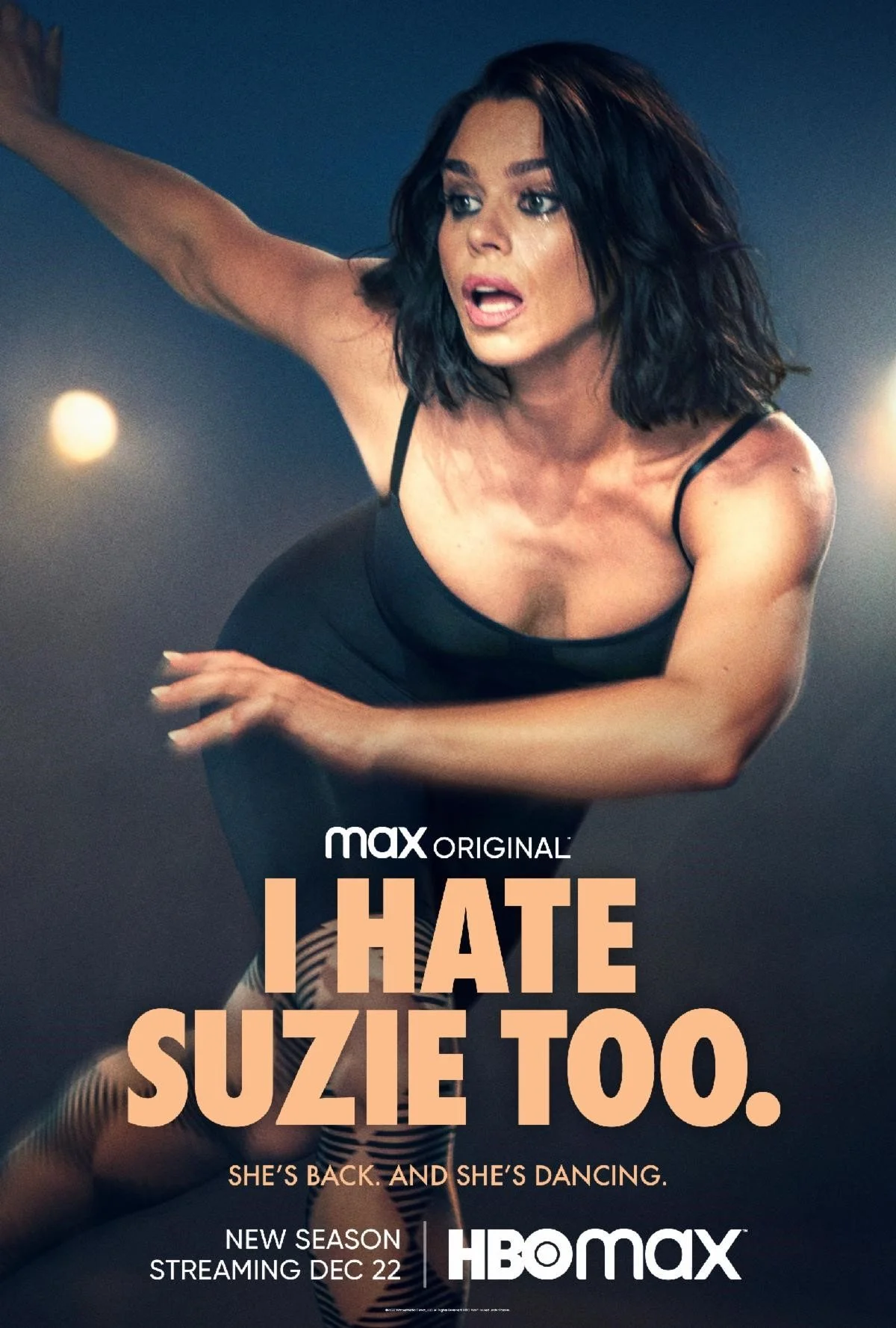 Promotional poster for the Max Original series 'I Hate Suzie Too.' Features a woman with dark, wavy hair wearing a black sports bra and striped tights, appearing to be in motion, with lighting effects in the background. Text mentions the show returni