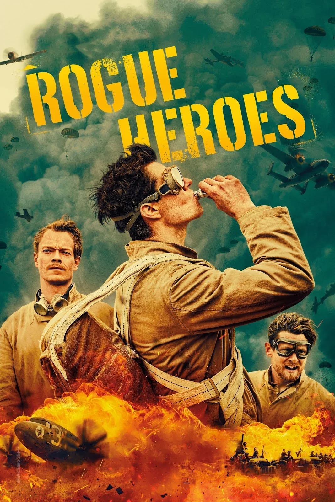 Movie poster for 'Rogue Heroes' featuring three soldiers in military gear amidst explosions, with planes and parachutes in the cloudy sky background.