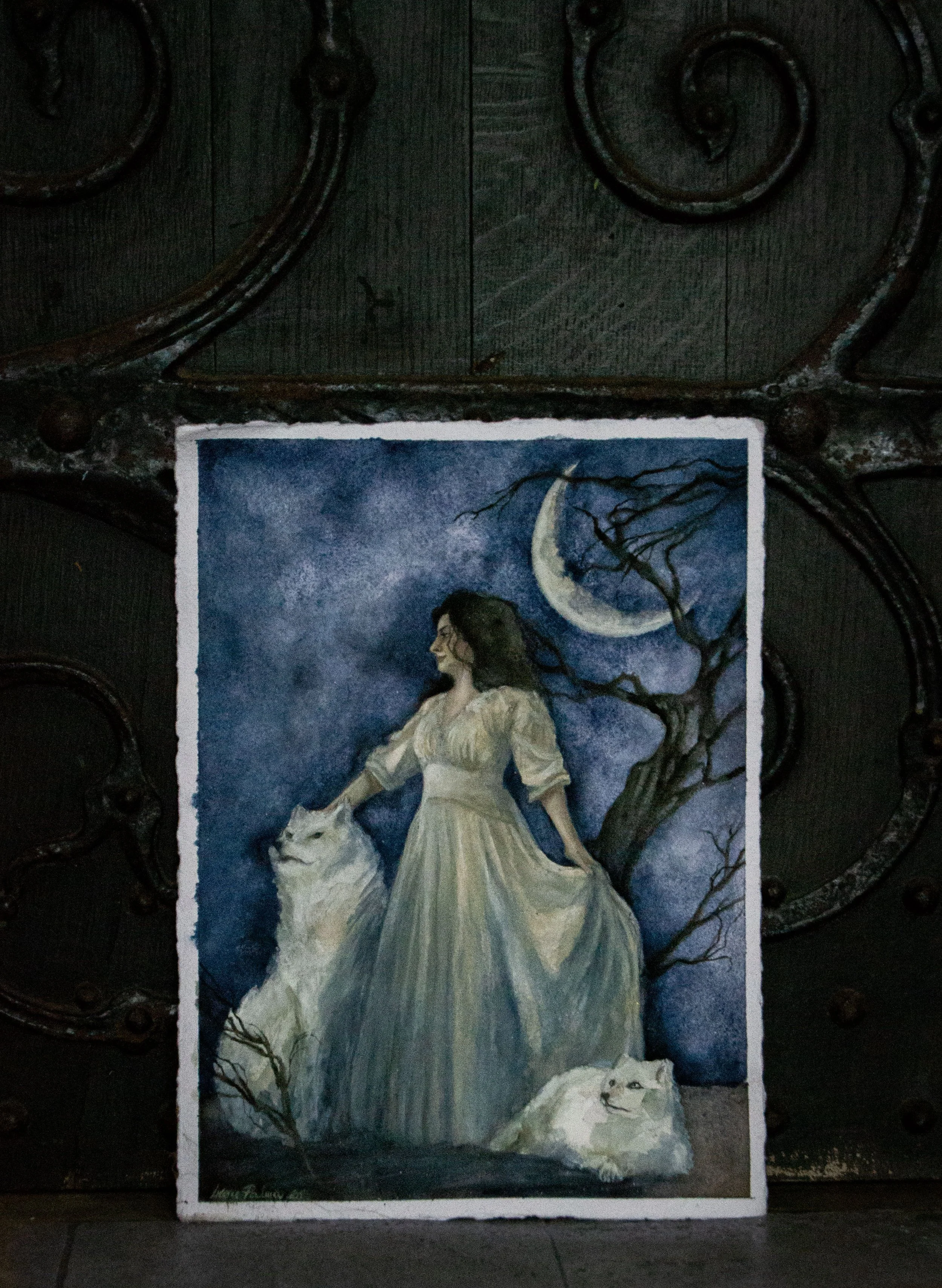 Watercolour painting of a winter Queen dressed in white with an arctic wolf and arctic fox. Nightscape, with Moon and dead tree.
