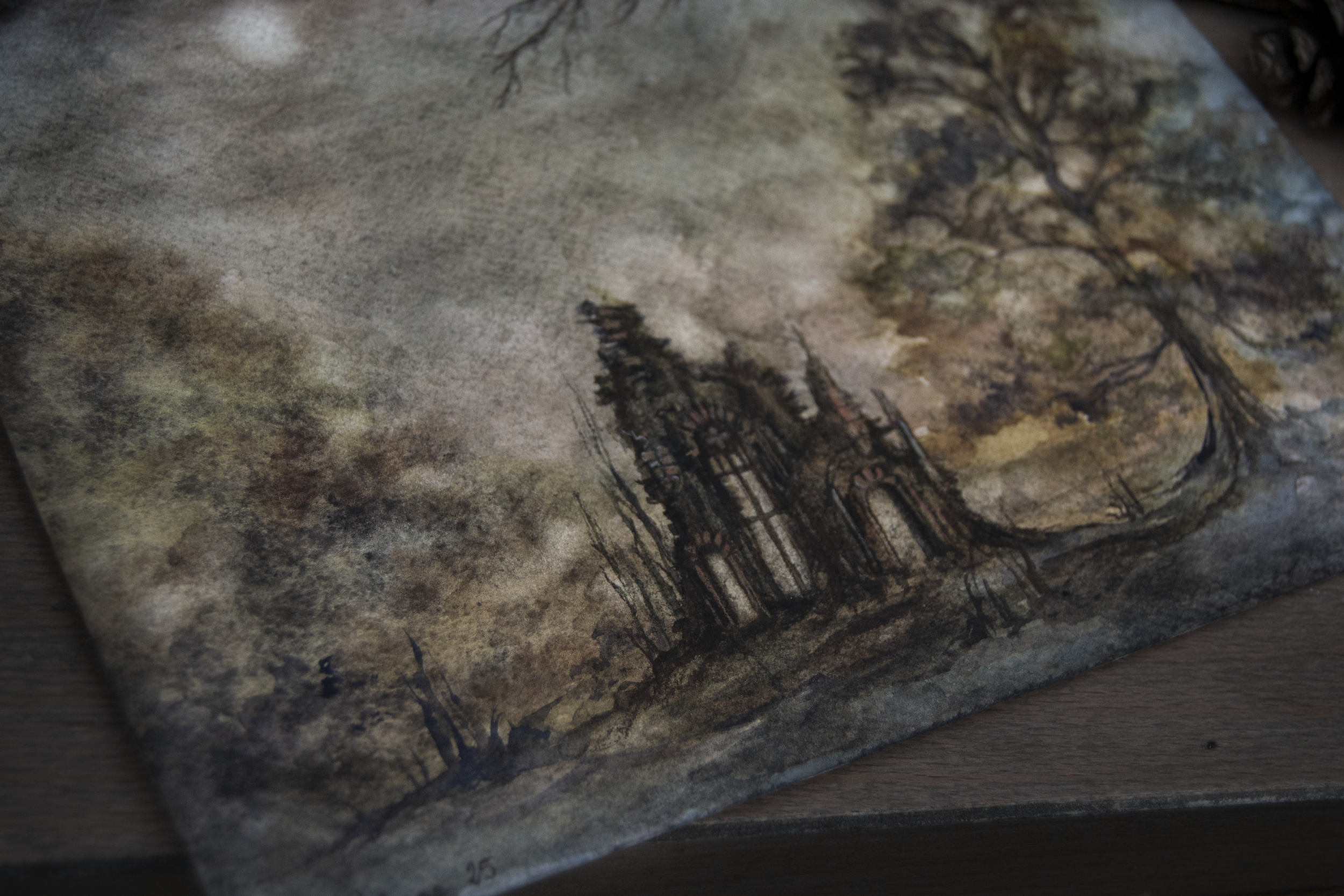 "Ruins", Gouache painting of moody, dark, witchy ruins at dusk. A full moon, or a hazy setting sun is in the sky. The ruins of the old medieval abbey are surrounded by autumn trees and bushes.