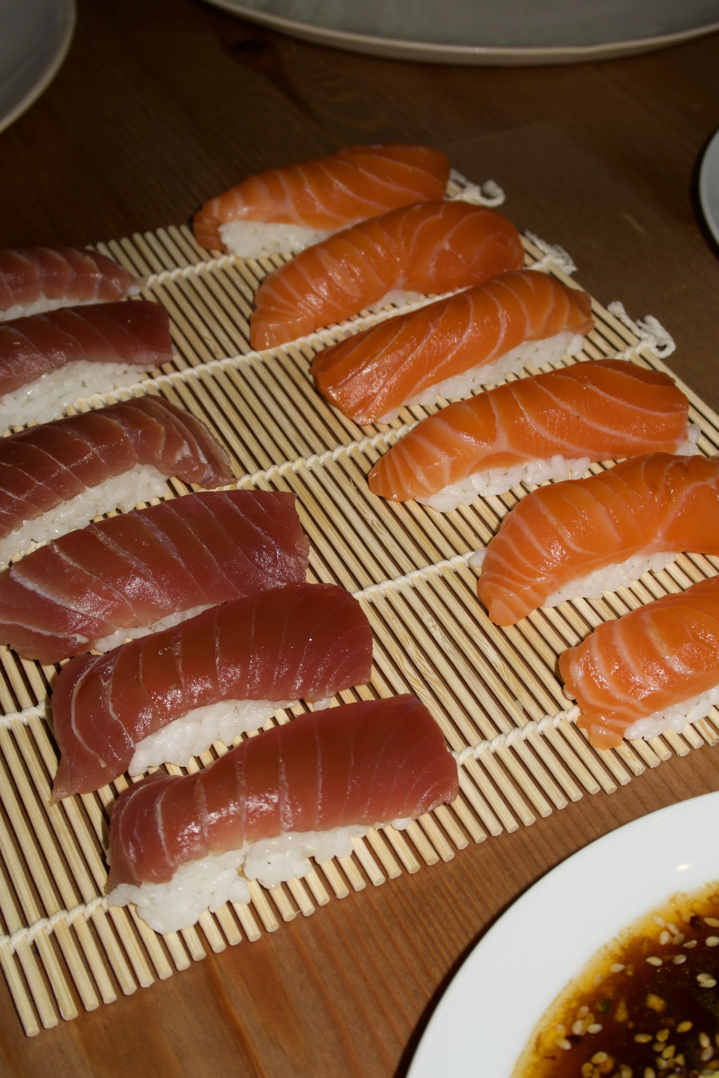 Salmon and Bluefin Tuna Nigiri Selection  Hand-pressed sushi rice topped with premium salmon and bluefin tuna
